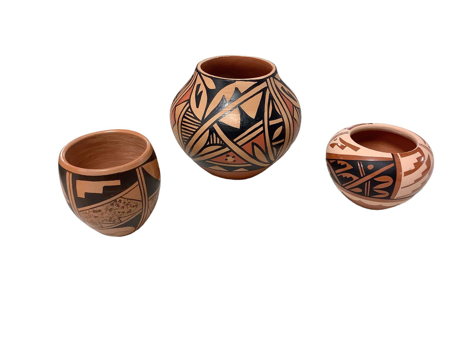 3 Native American artist signed Jemez Pottery bowls, Largest measuring 4.5" tall. (1 of 2)