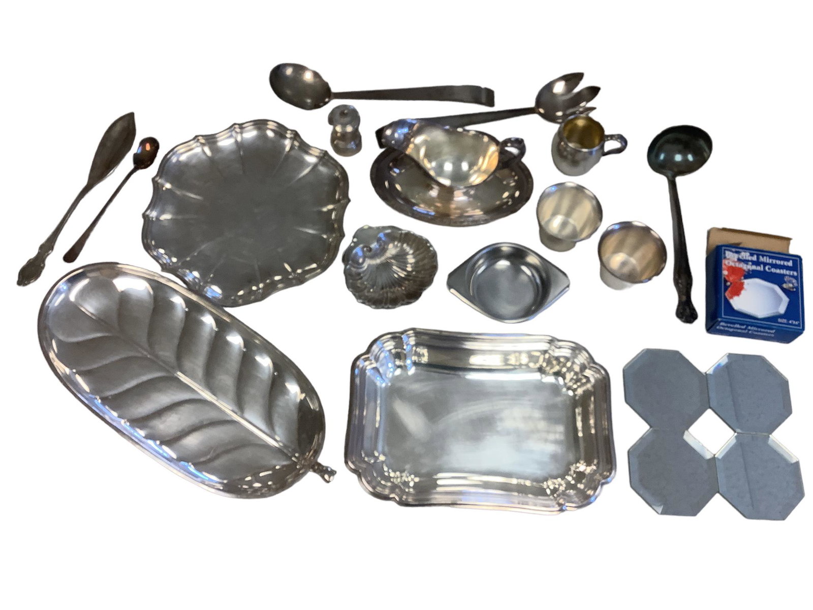 Lot of silver plated items including a 17" tray, a square server, a server plate, an attached gravy, (1 of 1)