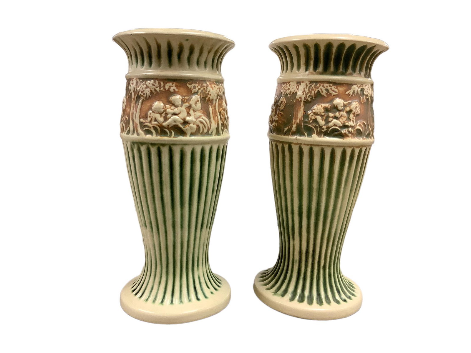 Roseville Donatello pattern of cherubs amidst the trees. Cream/Green/Tan. This lot includes two 12" (1 of 3)