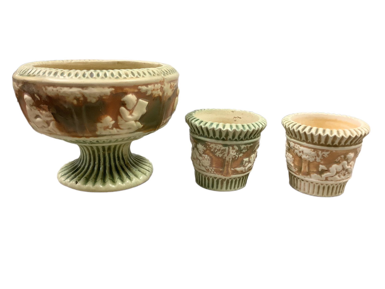 Roseville Donatello. There are three items in this lot., One is a footed bowl measuring 7" diameter, (1 of 3)