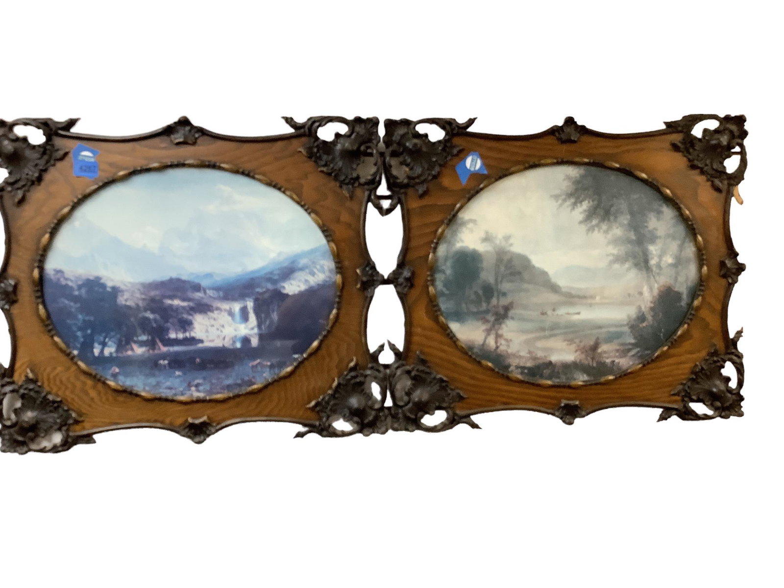 Framed artwork. Lot of 2 pictures each measuring 22" x 26" overall. (1 of 1)