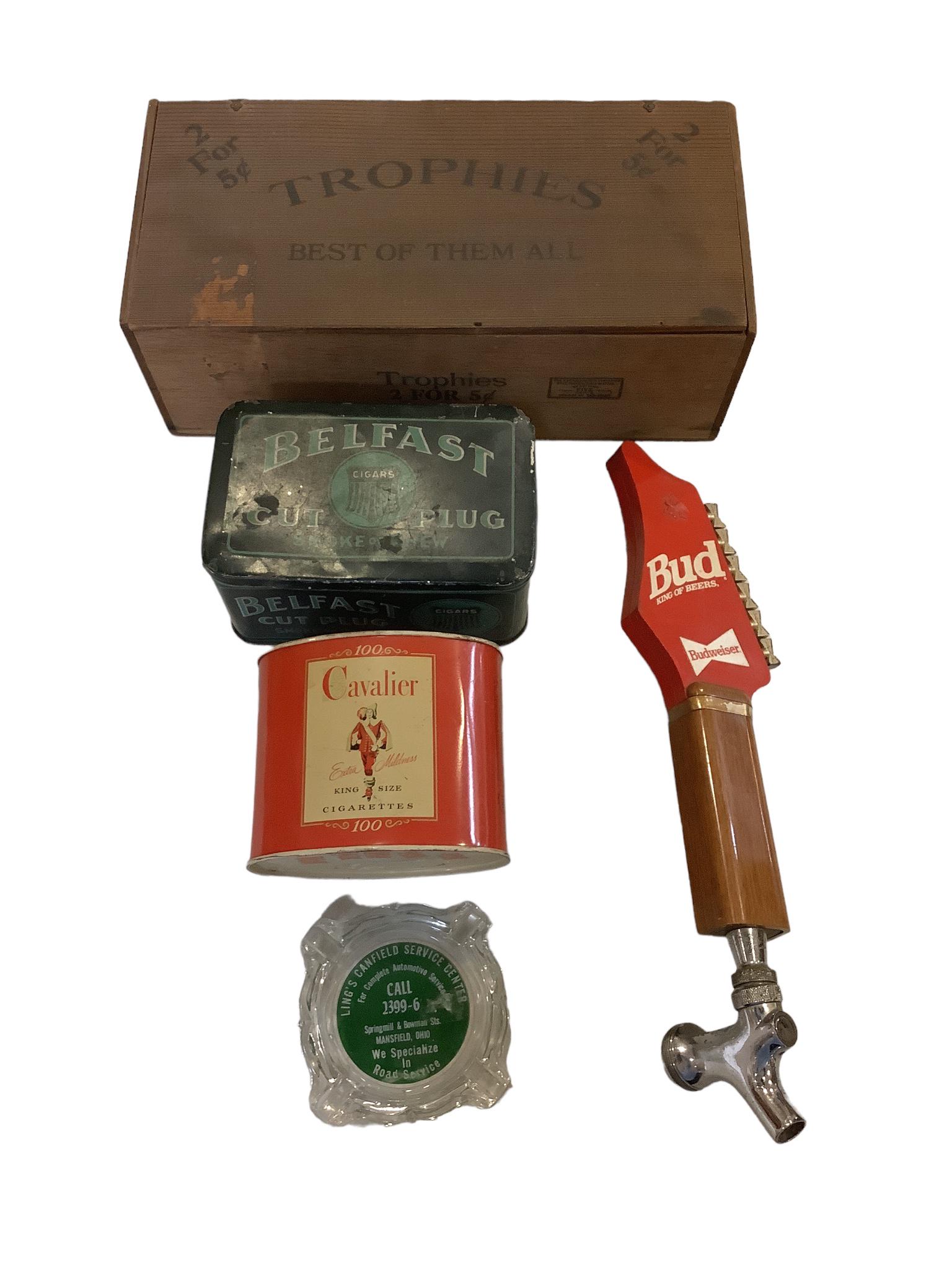 Box lot including tobacco tins, a glass ashtray, wood cigar box and a guitar draft beer pull tab.: Box lot including tobacco tins, a glass ashtray, wood cigar box and a guitar draft beer pull tab.