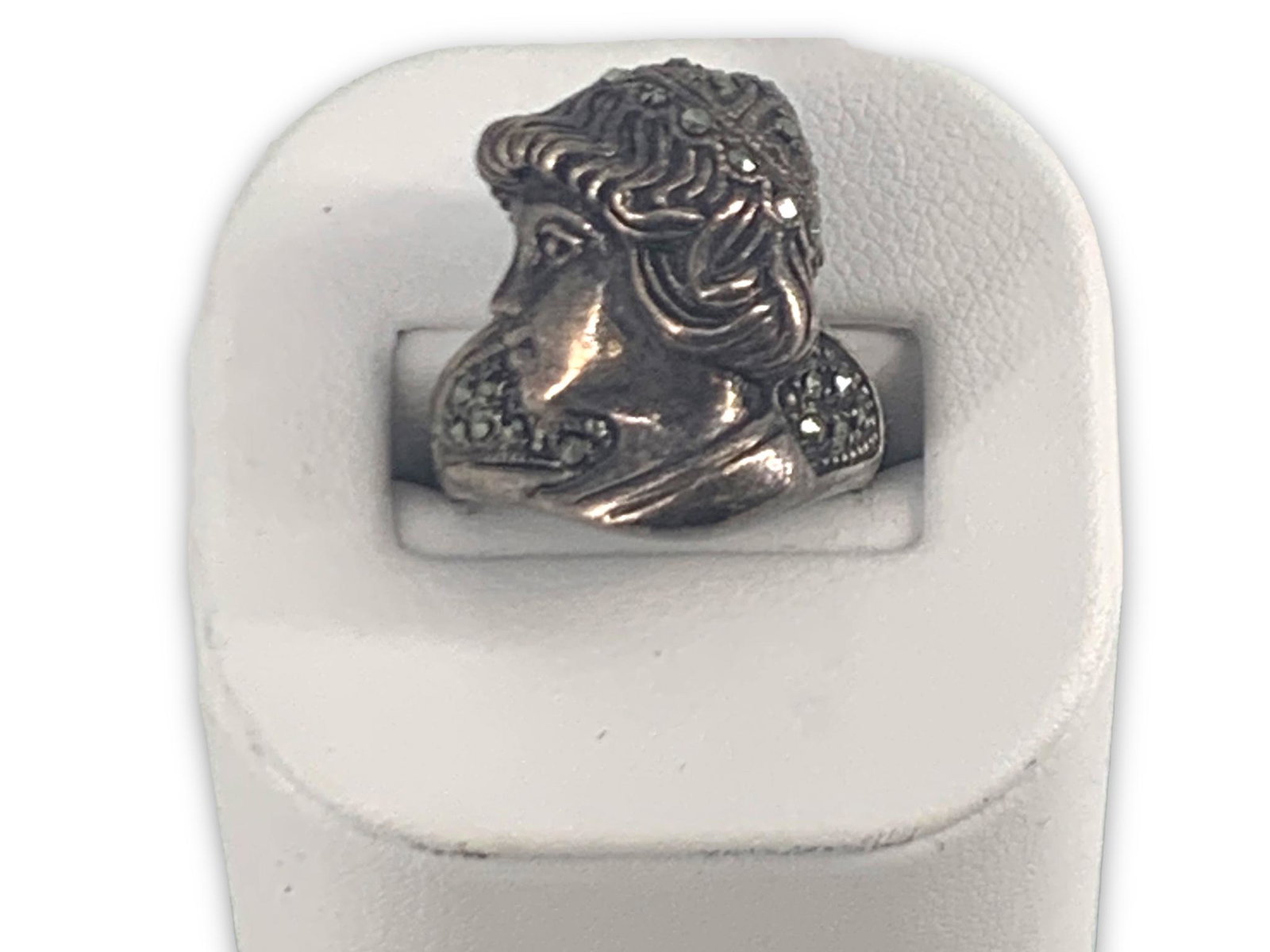 Sterling Silver Ring: Sterling Silver Ring Portrait design ft. image of young woman (high relief), stamped and tested 925/sterling silver, 4.7 dwt., size 7.5 tapered shank, with marcasite/pyrite stone adornments.