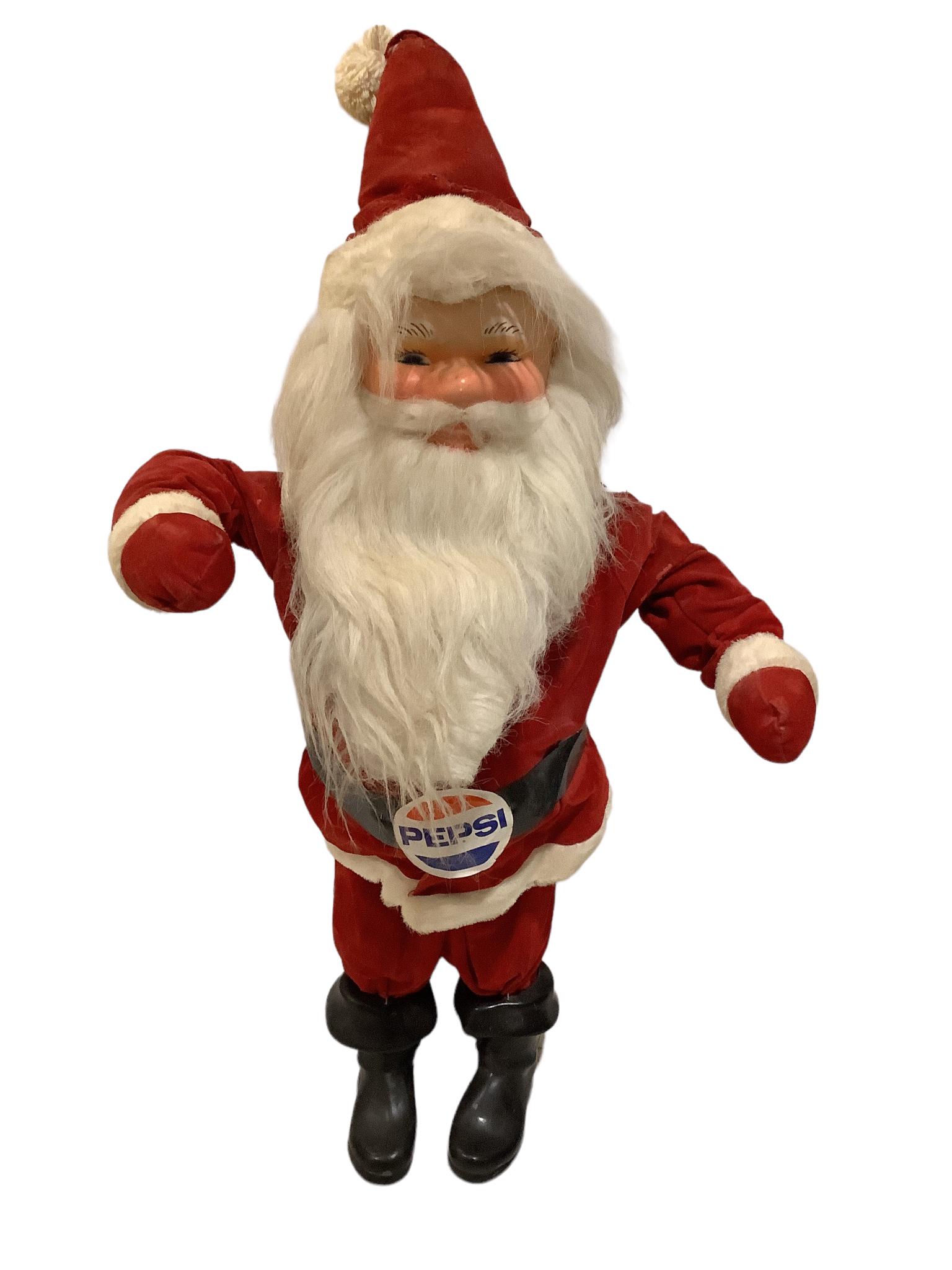 Vintage Pepsi Santa in a red suit with black boots. He stands 28" tall no including the pom pom. His: Vintage Pepsi Santa in a red suit with black boots. He stands 28" tall no including the pom pom. His face is a hard plastic, his arms have a wire in them, his legs are wood. His clothing is showing so
