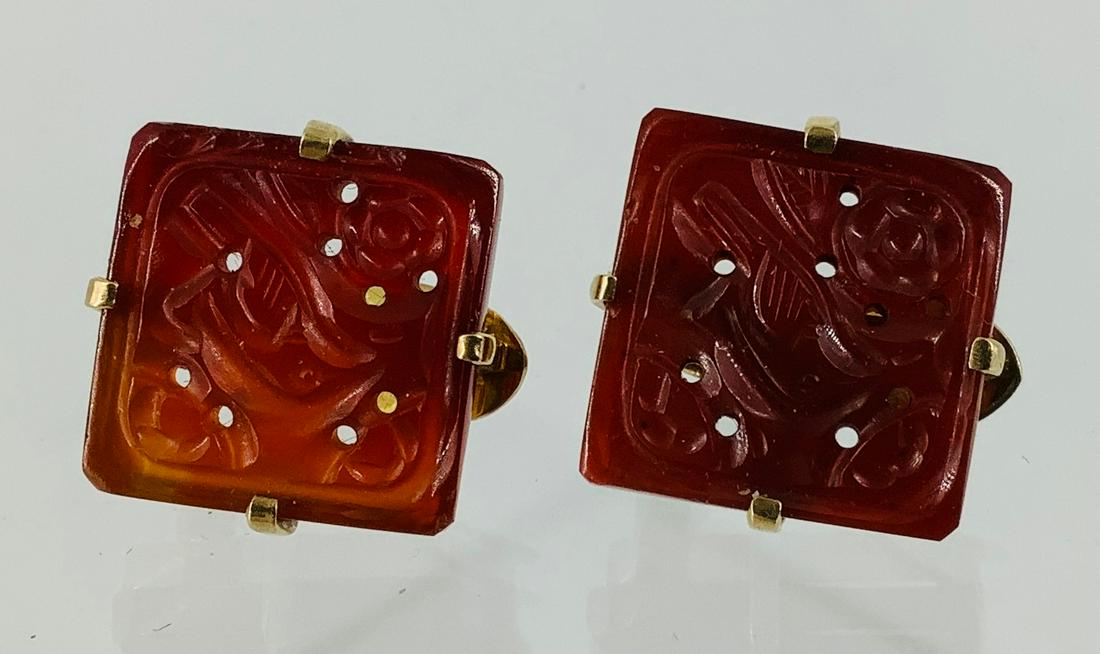 Unique Hand Carved 14kt Yellow Gold, Carnelian Earrings: Unique Hand Carved 14kt Yellow Gold, Carnelian Earrings Square tops measuring approx. (16.5mm x 16.5mm) featuring a bird motif, signed "Mogul" on the reverse (10.4 grams tw).