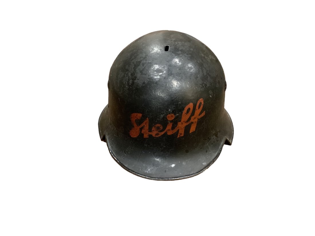 WWII German Luftschultz air raid helmet with liner. Strap is broken. Name Steiff painted on front.: WWII German Luftschultz air raid helmet with liner. Strap is broken. Name Steiff painted on front.