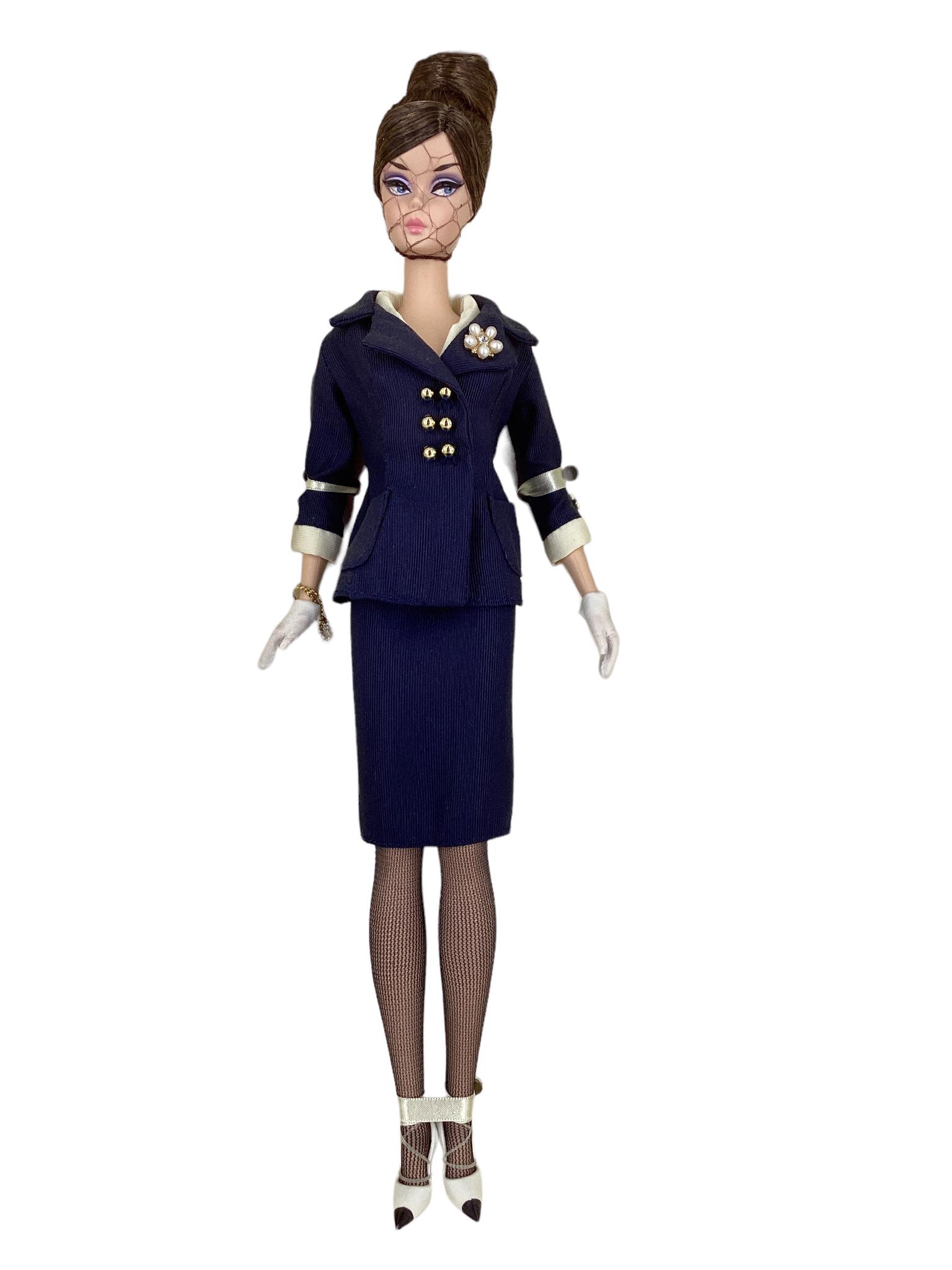 (1) BFMC BOATER ENSEMBLE SILKSTONE BARBIE - a Gold Label Barbie with no more than 5,300 dolls: (1) BFMC BOATER ENSEMBLE SILKSTONE BARBIE - a Gold Label Barbie with no more than 5,300 dolls worldwide. Barbie wears a blue suit, white gloves, spectacular pumps, and a charming boater hat. Gold Labe