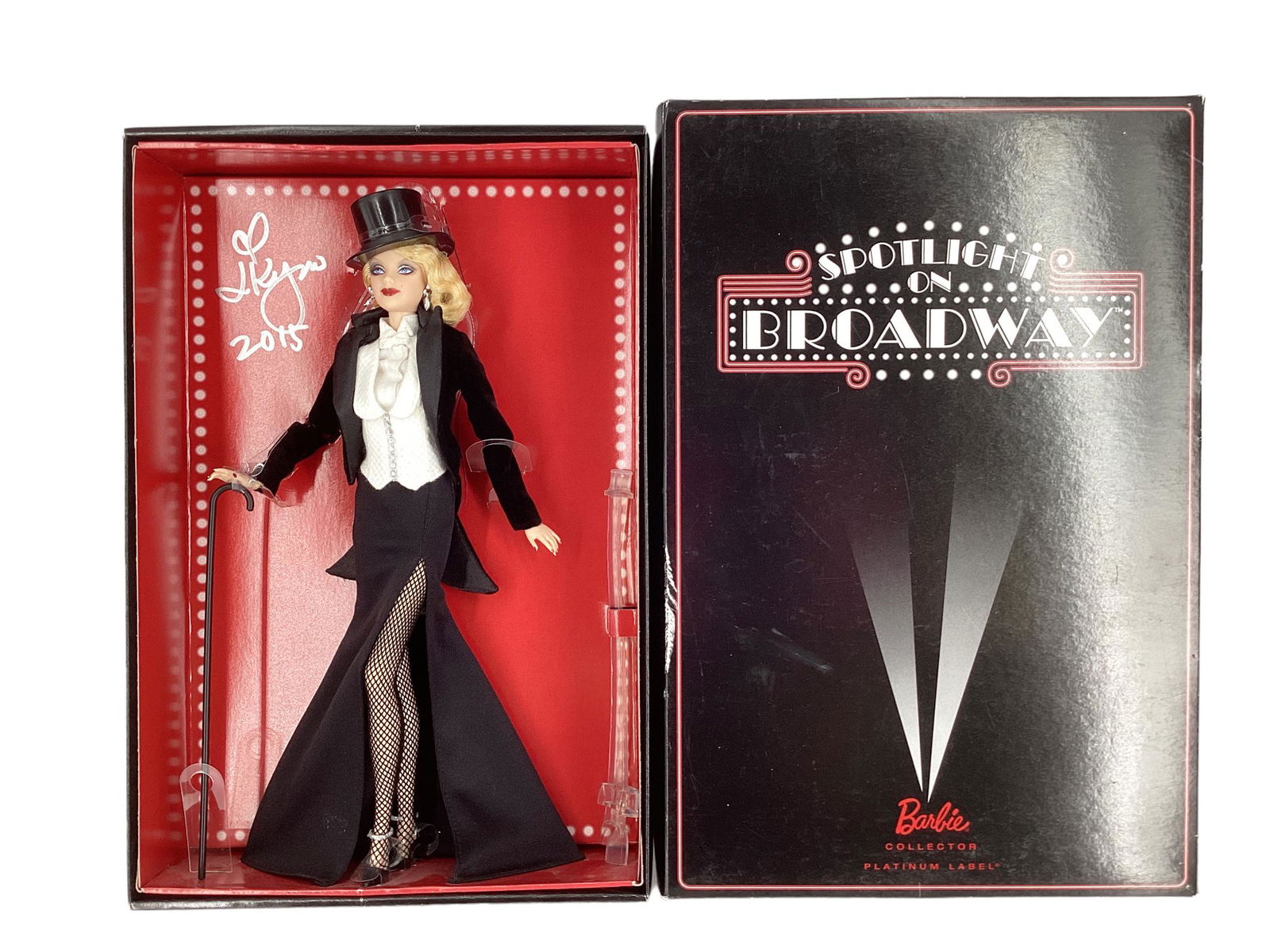 (1) SPOTLIGHT ON BROADWAY BARBIE, the official Barbie of the 2015 Barbie Convention. A gorgeous: (1) SPOTLIGHT ON BROADWAY BARBIE, the official Barbie of the 2015 Barbie Convention. A gorgeous blond Barbie wearing stunning formalwear with her hat & cane. Barbie has a signature inside of her box a