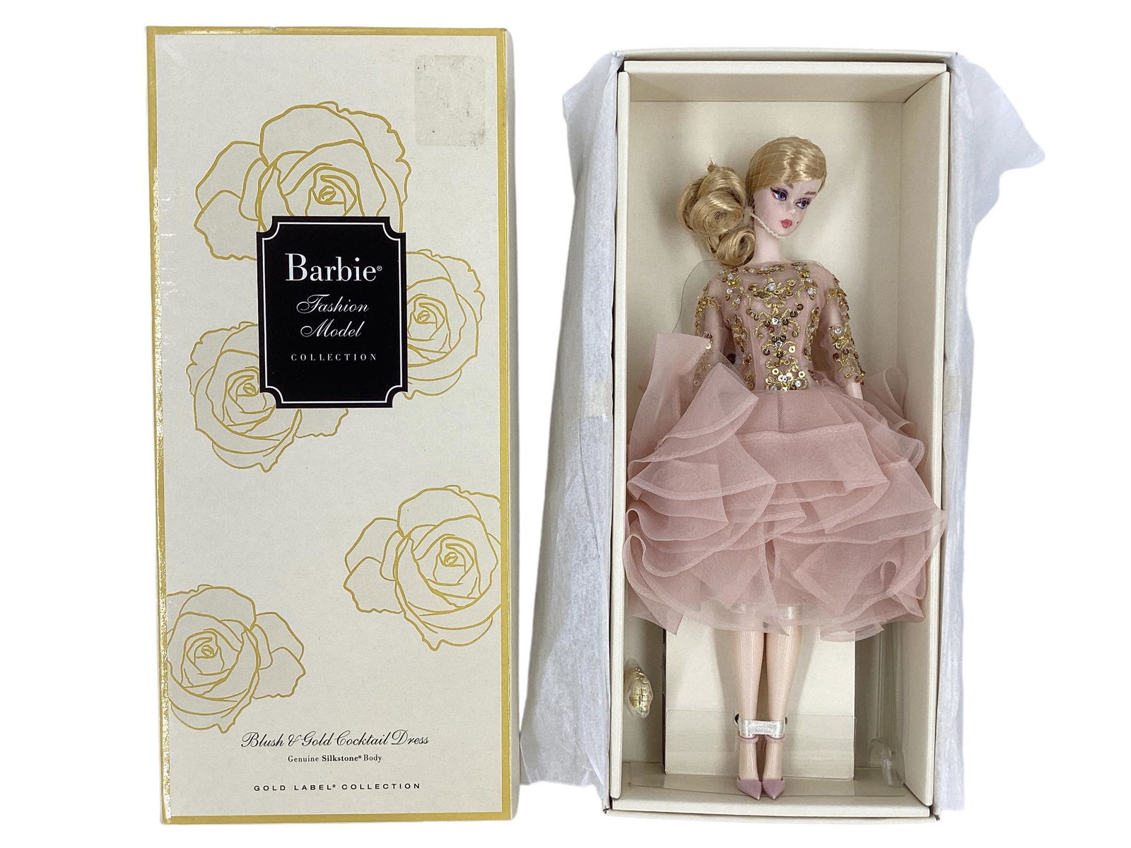 NRFB BLUSH & GOLD COCKTAIL BARBIE w/ Classic Cocktail Genuine Silkstone Body and a Gold Label: NRFB BLUSH & GOLD COCKTAIL BARBIE w/ Classic Cocktail Genuine Silkstone Body and a Gold Label Collection w/ no more than 10,000 worldwide. Blond Ponytail Barbie w/blush taffeta cocktail dress/w tulle