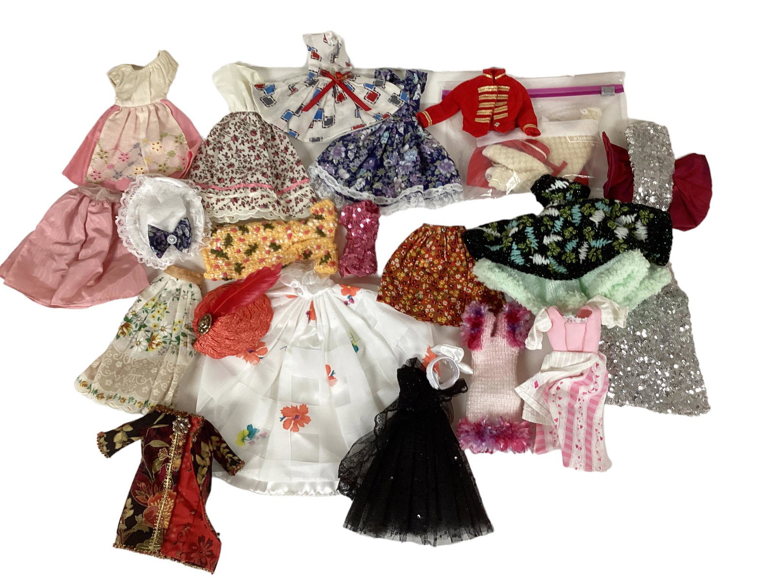 (1) Beautiful lot of Barbie Clothing including some vintage Barbie tagged clothes, crocheted and: (1) Beautiful lot of Barbie Clothing including some vintage Barbie tagged clothes, crocheted and beautiful homemade outfits.