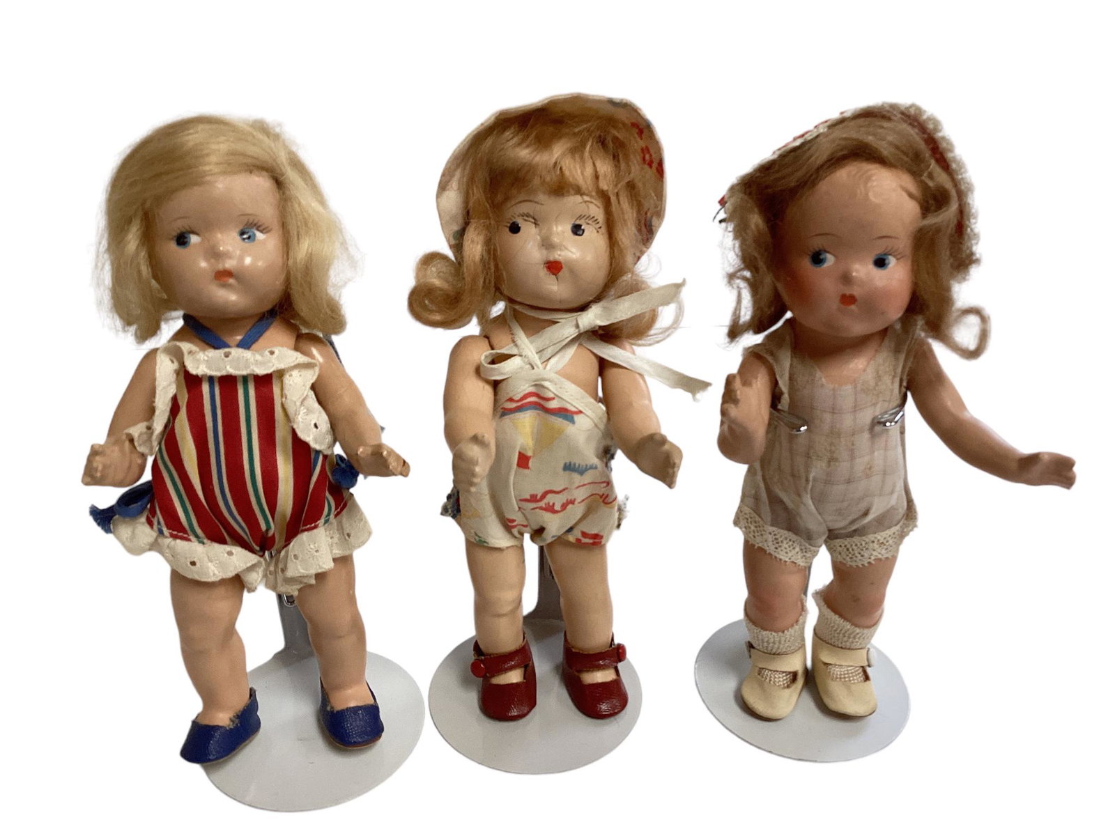Lot of (3) 8" Composition Toddles dolls including brown hair in untagged white outfit (has some (1 of 3)