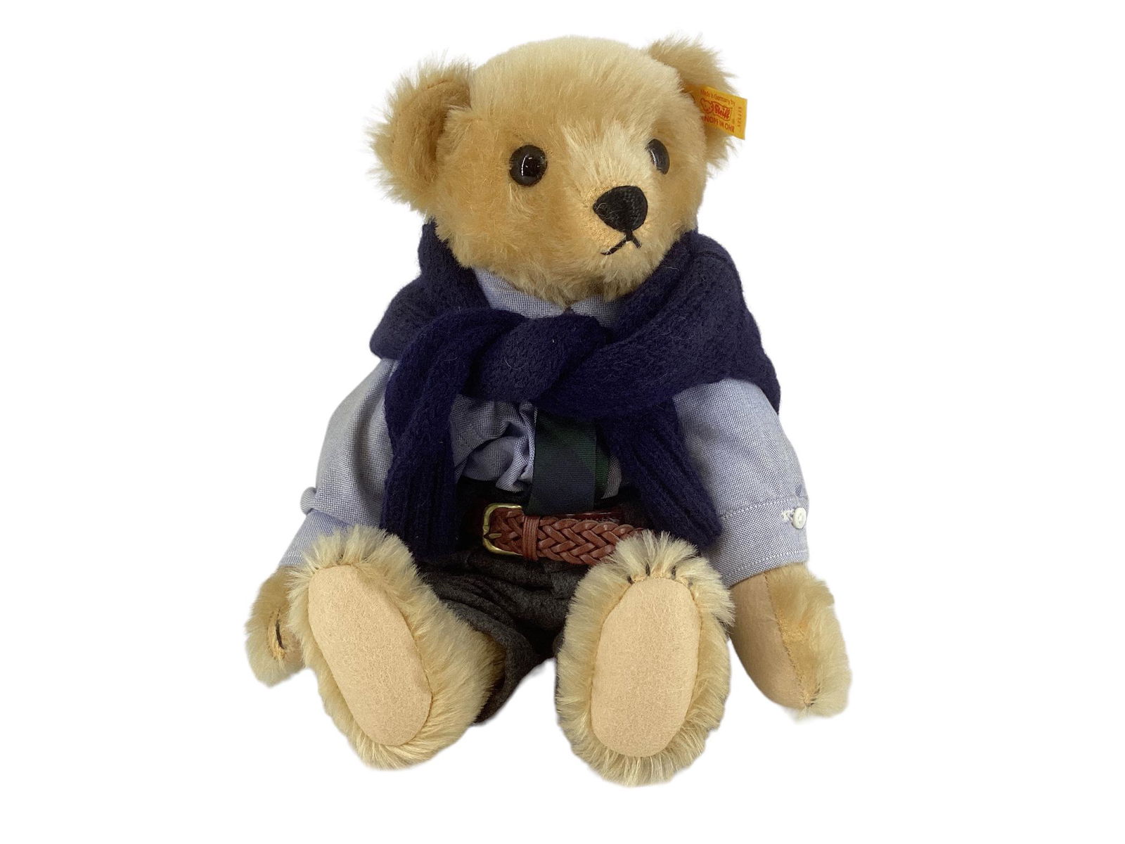 Steiff "Polo Bear" by Ralph Lauren. 13" gold mohair bear with glass eyes, stitched nose and mouth,: Steiff "Polo Bear" by Ralph Lauren. 13" gold mohair bear with glass eyes, stitched nose and mouth, disk jointed head, arms and legs, felt paw pads. Polo Bear is dressed in authentic Polo attire made i