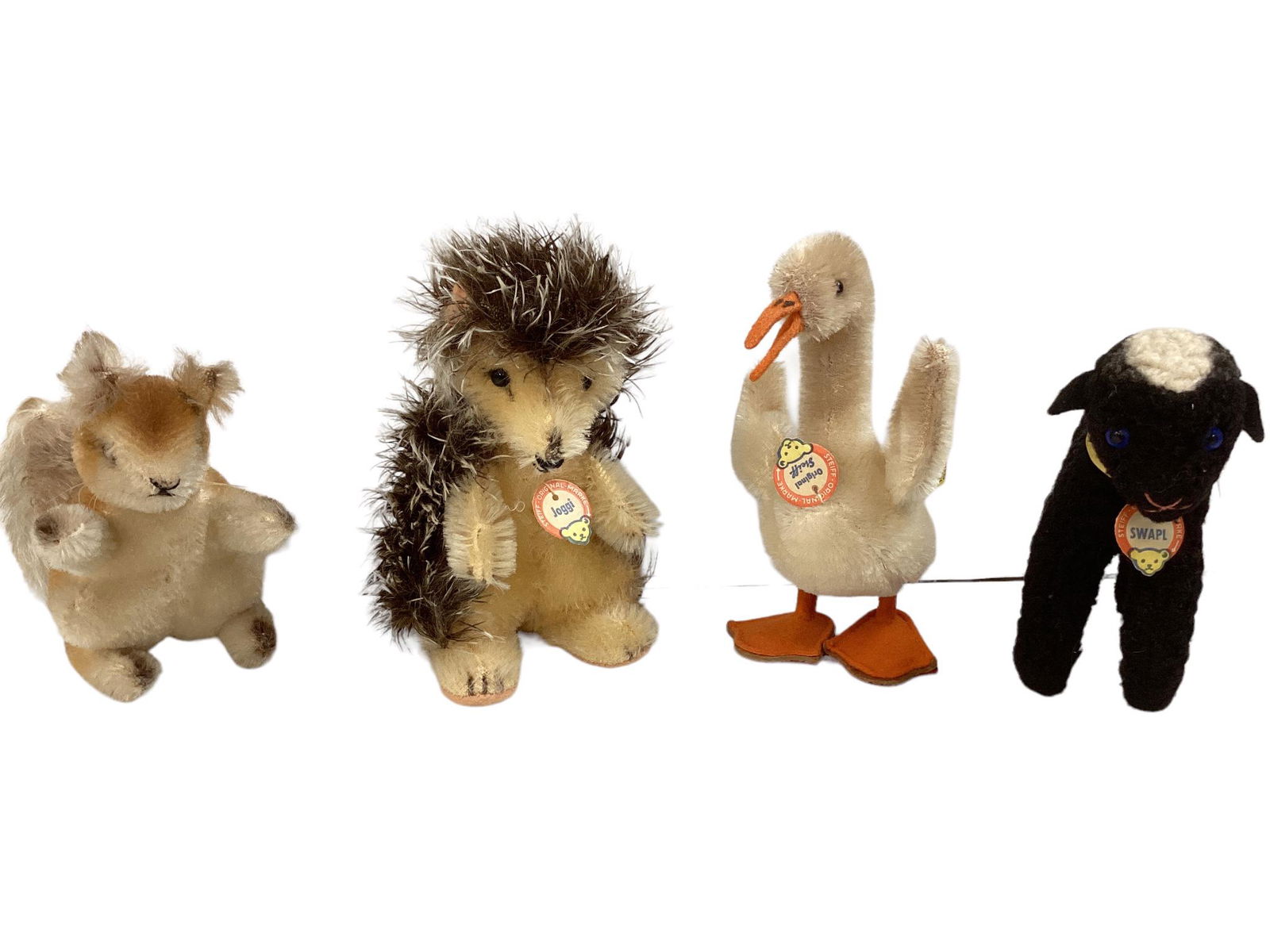 (4) small Steiff animals. Includes 4 1/2" Joggi Hedgehog, 5" Tulla Goose, 3 1/2" Possy Squirrel and (1 of 4)