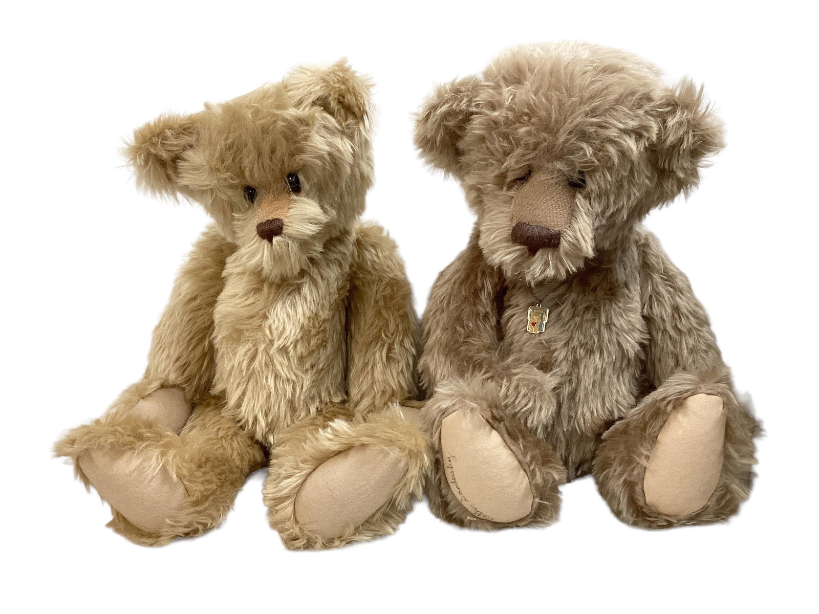 Collection of (2) artist bears including 17" Kathy Sandusky beige mohair, pellet filled and wears a (1 of 3)