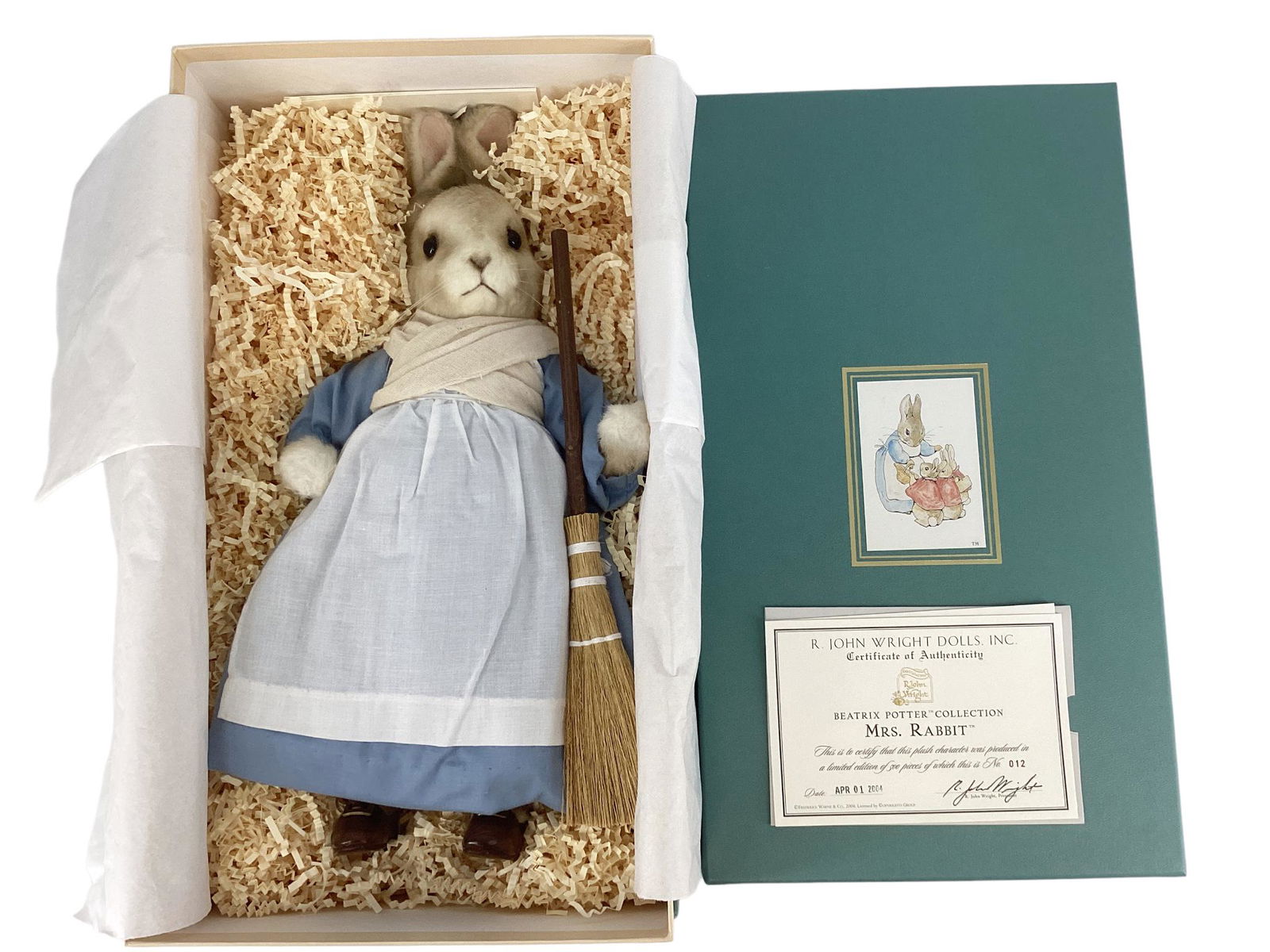 R. John Wright "Mrs. Rabbit" from the Beatrix Potter Collection. 14" mohair plush rabbit with glass: R. John Wright "Mrs. Rabbit" from the Beatrix Potter Collection. 14" mohair plush rabbit with glass eyes, stitched nose and mouth with whiskers, jointed head, arms and legs. Mrs. Rabbit is costumed in