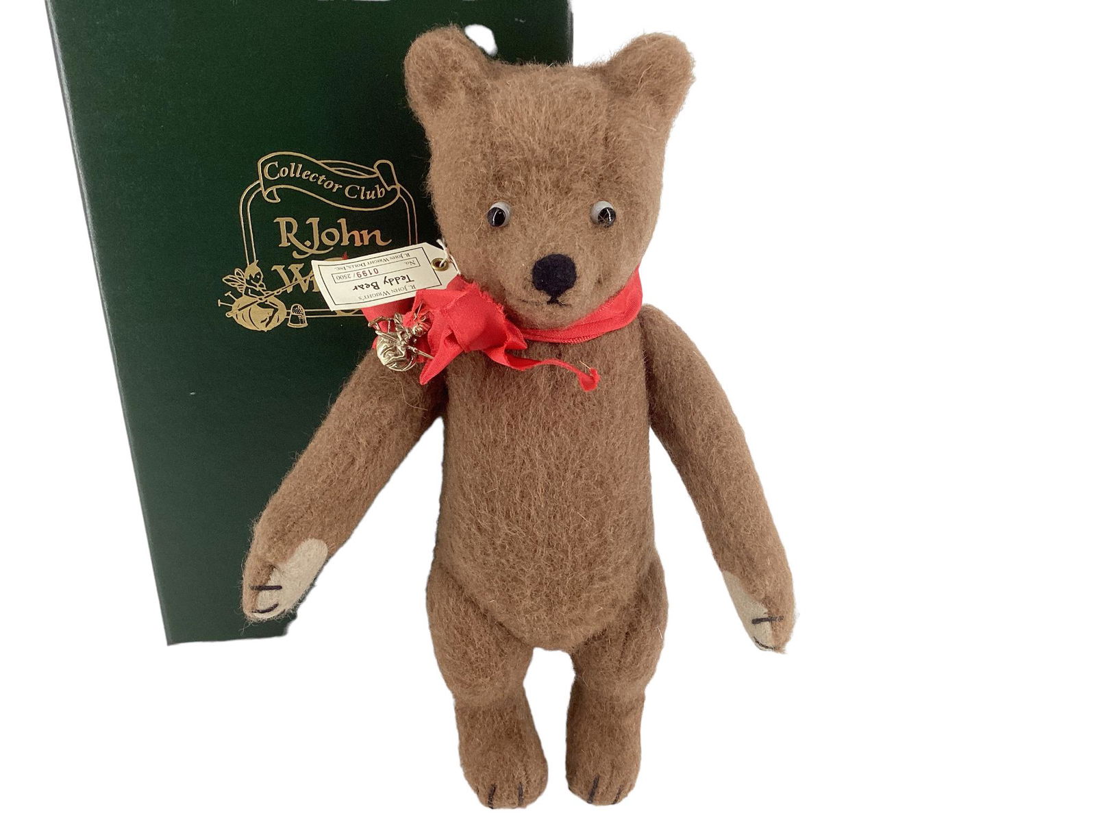 R. John Wright "Teddy Bear". 9" wool bear with glass eyes, stitched nose, jointed head, arms and: R. John Wright "Teddy Bear". 9" wool bear with glass eyes, stitched nose, jointed head, arms and legs. Made exclusively for the R. John Wright Collector Club, Limited Edition No. 199/2500. Teddy comes