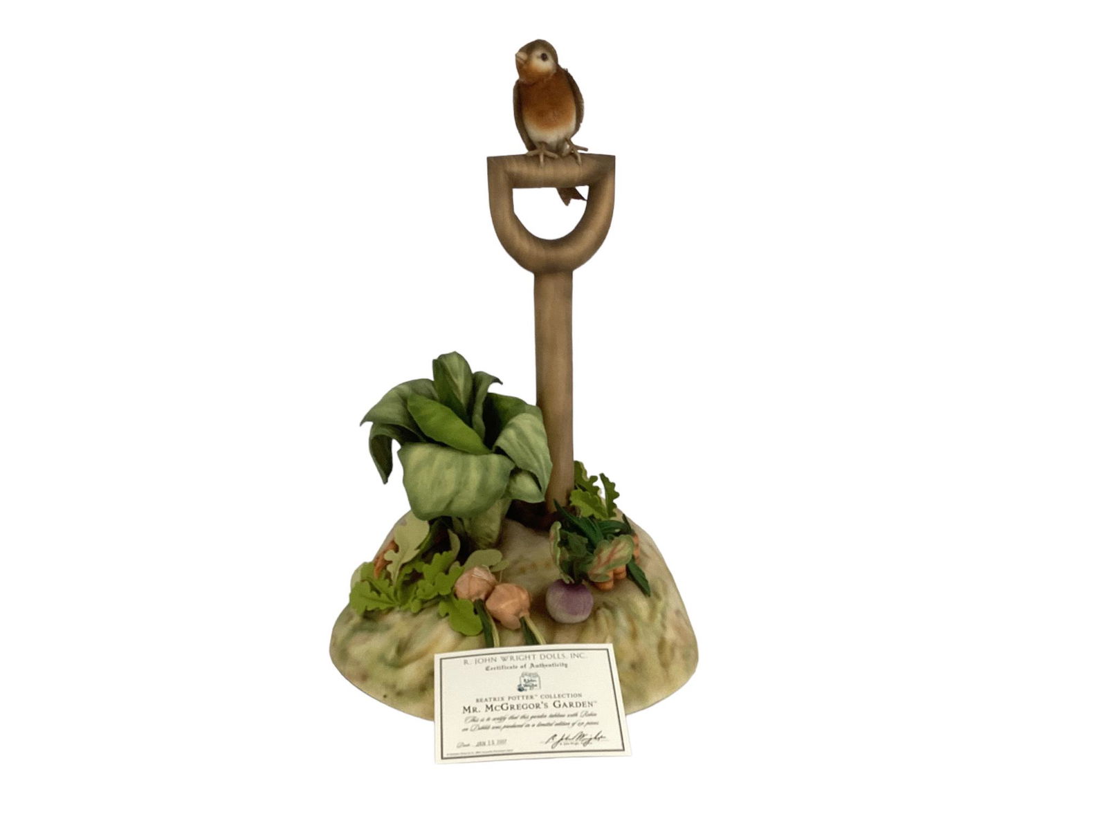 R. John Wright 2007 Beatrix Potter Collection 20 1/2" "Mr. McGregor's Garden, molded gelt mound with: R. John Wright 2007 Beatrix Potter Collection 20 1/2" "Mr. McGregor's Garden, molded gelt mound with various felt vegetables and wooden dibble tool. Mohair robin with jointed neck and felt beak/feet a