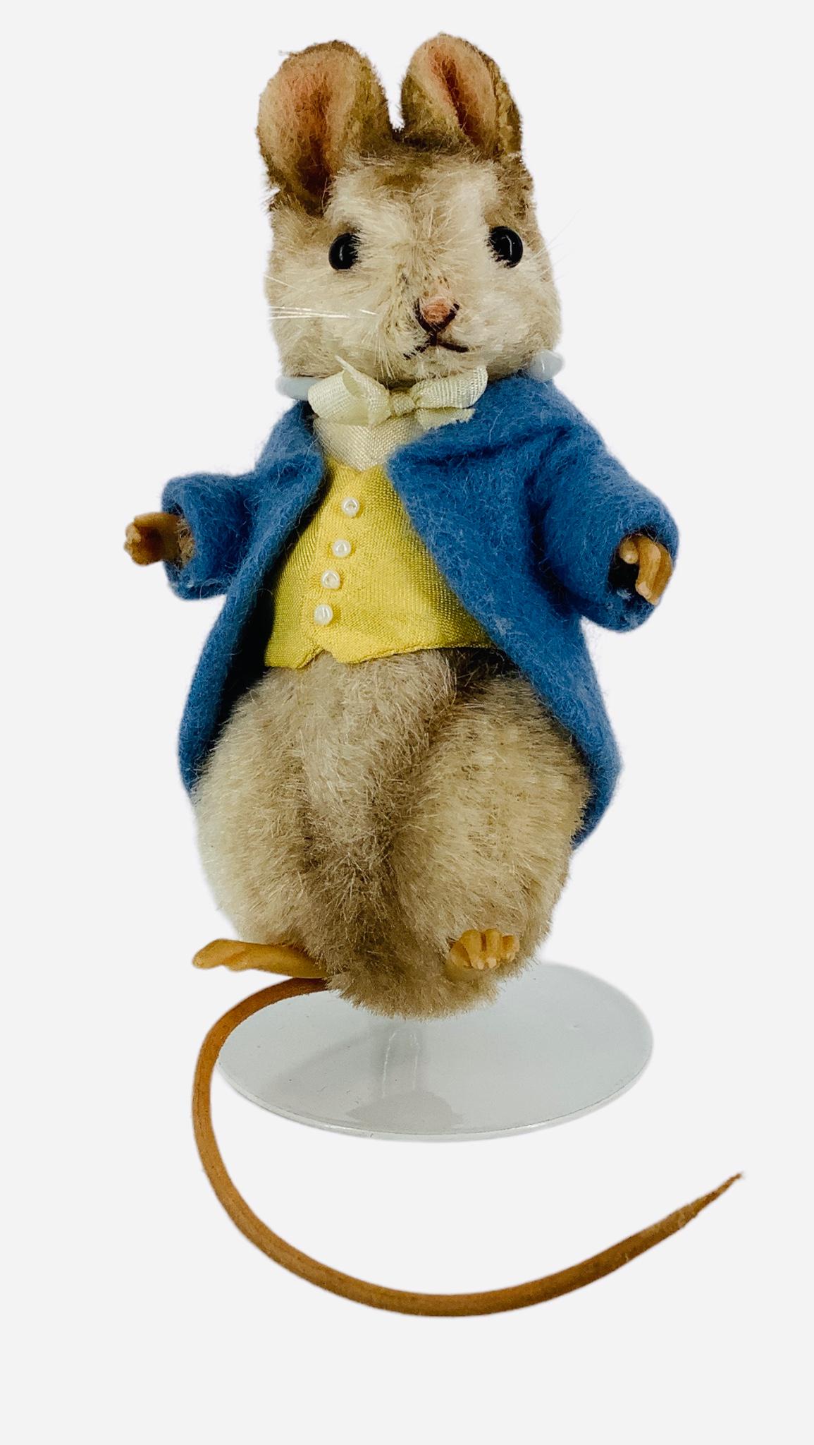 R. John Wright "Johnny Town Mouse". 3 1/2" mohair mouse with applied ears, glass bead eyes, resin: R. John Wright "Johnny Town Mouse". 3 1/2" mohair mouse with applied ears, glass bead eyes, resin paws, leather tail, jointed head and arms. Comes in original box with COA. Made exclusively for member