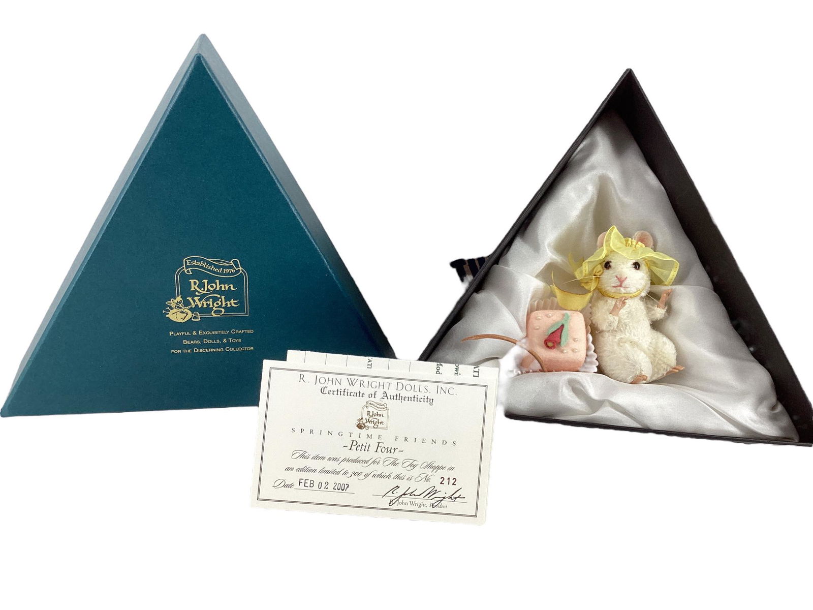 R. John Wright "Petit Four". 3" mohair mouse with applied ears, glass bead eyes, resin paws, jointed: R. John Wright "Petit Four". 3" mohair mouse with applied ears, glass bead eyes, resin paws, jointed at the neck and shoulders. Made for The Toy Shoppe, Limited Edition No. 212/300. Comes in her origi