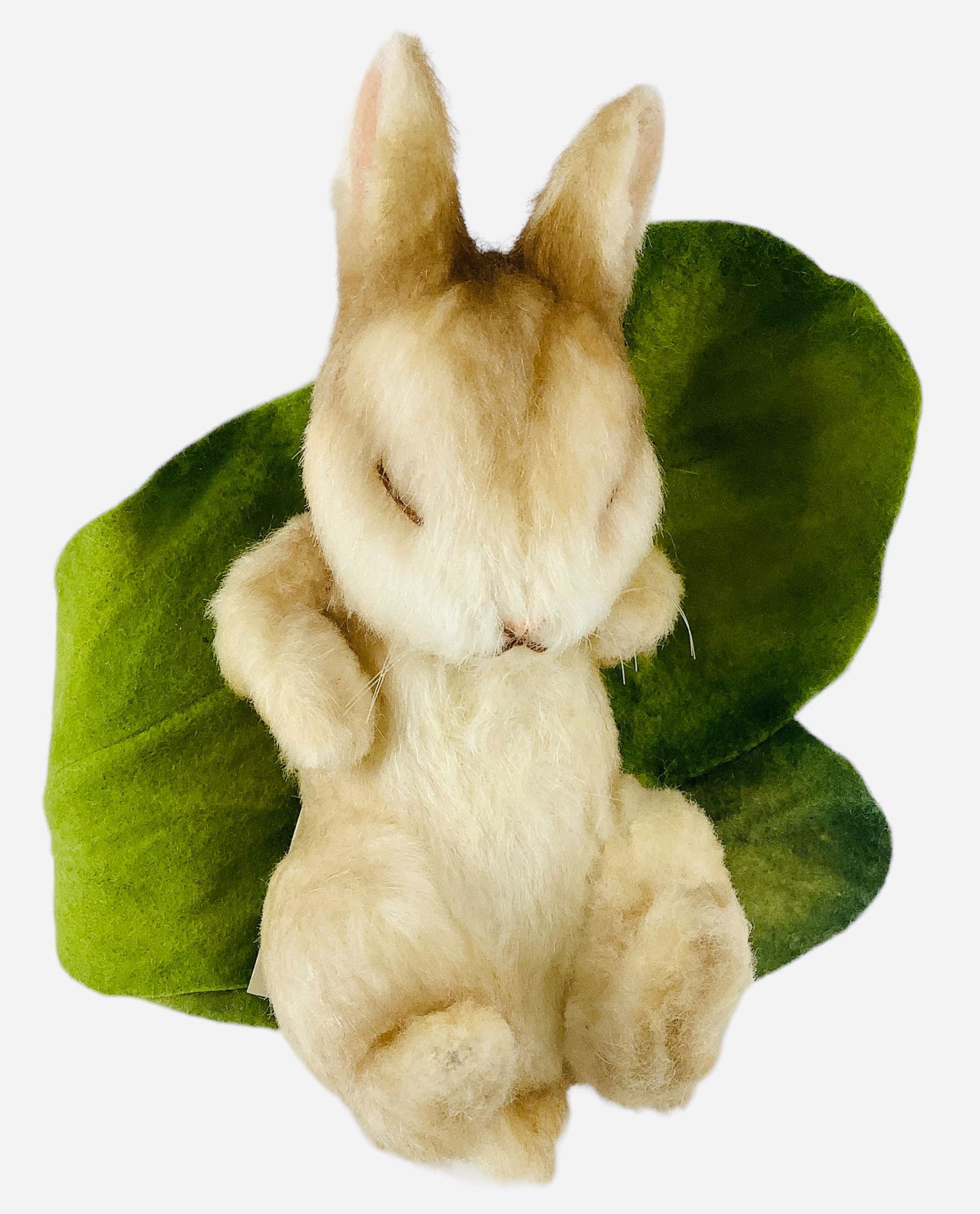 R. John Wright "Flopsy Bunny" from the Beatrix Potter Collection. 5 1/2" long mohair bunny with: R. John Wright "Flopsy Bunny" from the Beatrix Potter Collection. 5 1/2" long mohair bunny with embroidered facial features, jointed head, arms and legs. Flopsy is nestled in her wool felt cabbage lea