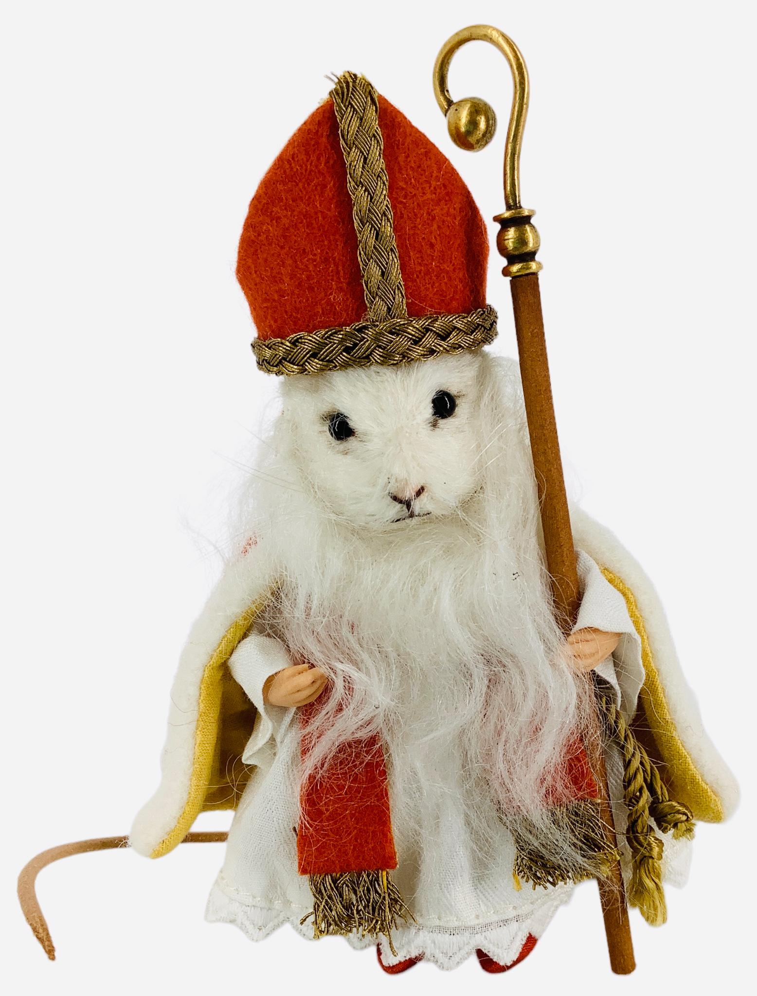 R. John Wright 2016 Christmas Mouse "St. Nicholas". 3 1/2" mohair mouse with applied ears, mohair: R. John Wright 2016 Christmas Mouse "St. Nicholas". 3 1/2" mohair mouse with applied ears, mohair beard, glass bead eyes, resin paws, leather tail, jointed head and arms, dressed in papal gown and rob