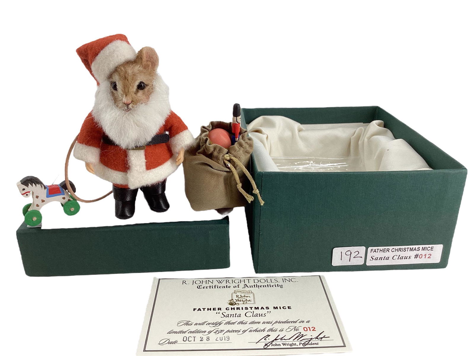 R. John Wright Father Christmas Mice "Santa Claus". 3 3/4" mohair mouse with applied ears, glass: R. John Wright Father Christmas Mice "Santa Claus". 3 3/4" mohair mouse with applied ears, glass bead eyes, resin paws, leather tail, jointed head and arms, mohair beard, dressed in red wool Santa sui