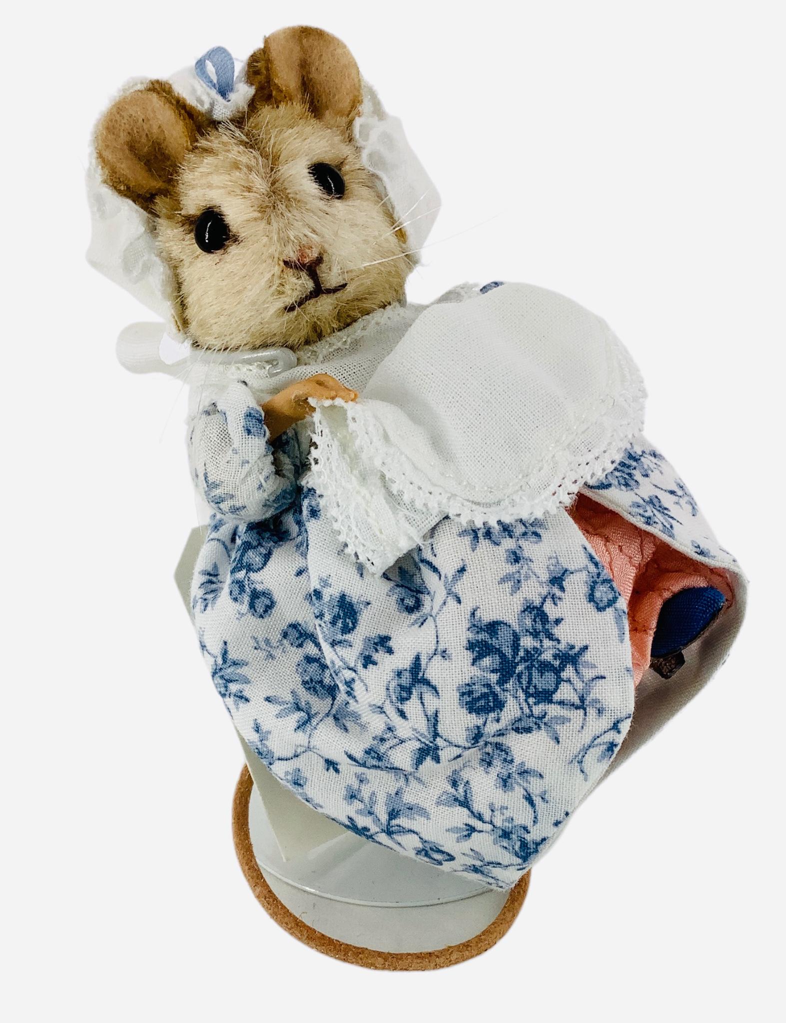 R. John Wright "Lady Mouse" from the Beatrix Potter Collection. 3 1/4" mohair mouse with applied: R. John Wright "Lady Mouse" from the Beatrix Potter Collection. 3 1/4" mohair mouse with applied ears, glass bead eyes, resin paws, leather tail, jointed head and arms. Comes in original box with COA,
