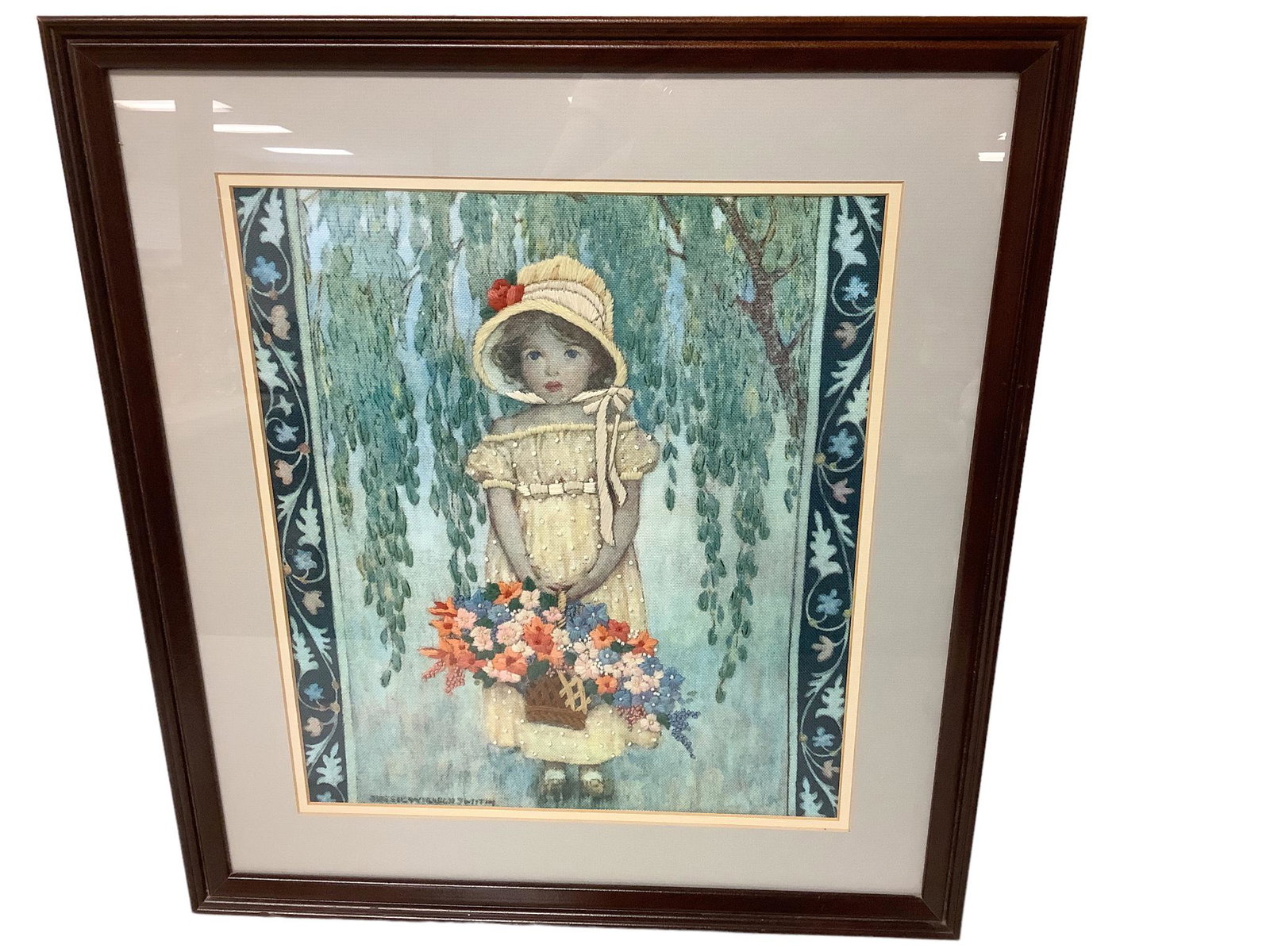 A 20” wide and 22” tall Jesse Wilcox Smith needlepoint and crewel-work picture under (1 of 4)