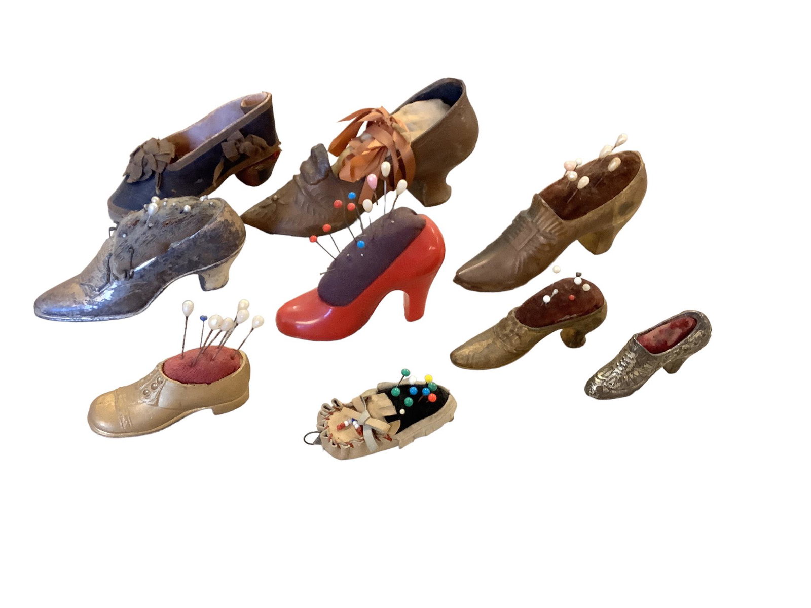 Lot of 9 vintage shoe shaped pin cushions ranging in size from 3” leather moccasin to (1 of 1)