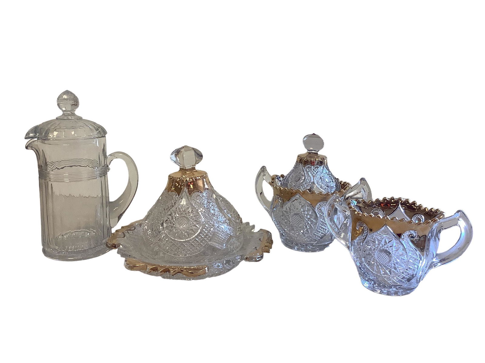 Lot of 4. Heisey 6” pitcher with lid. Cut glass 8” covered plate with golden accents. (1 of 3)