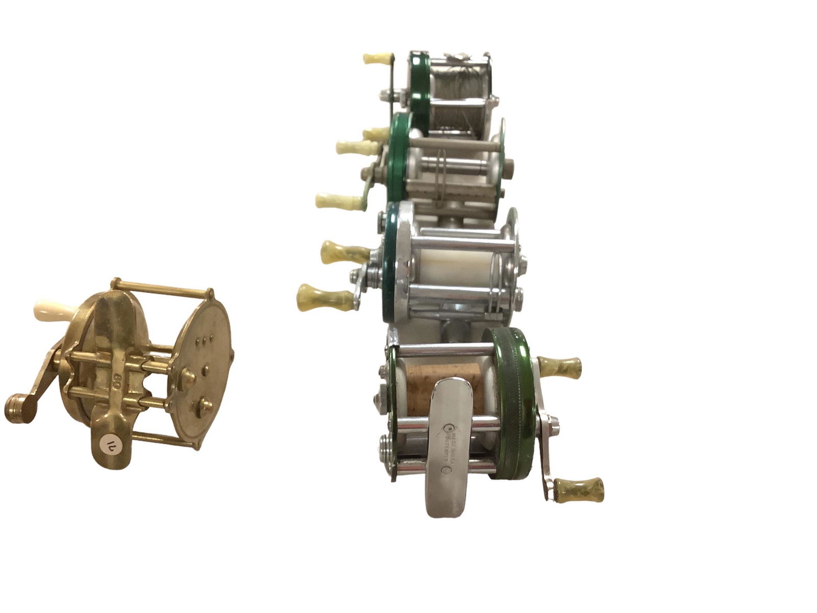 Lot with 1 Atlas and 4 Shakespeare Bait Casting Reels (1 of 1)