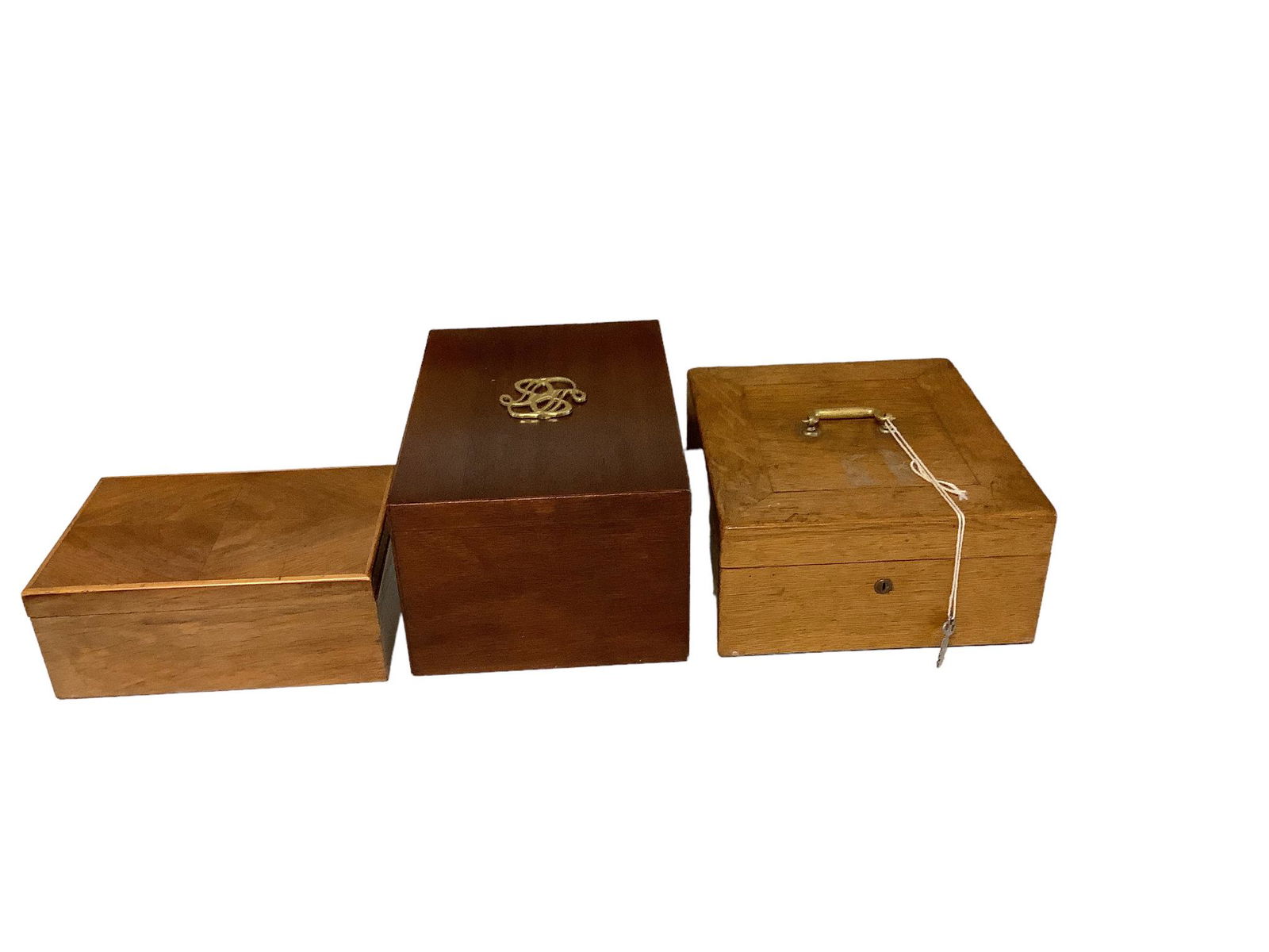Lot of three wooden boxes with hinged lids ranging in height from 3.75”- 6”, including (1 of 1)