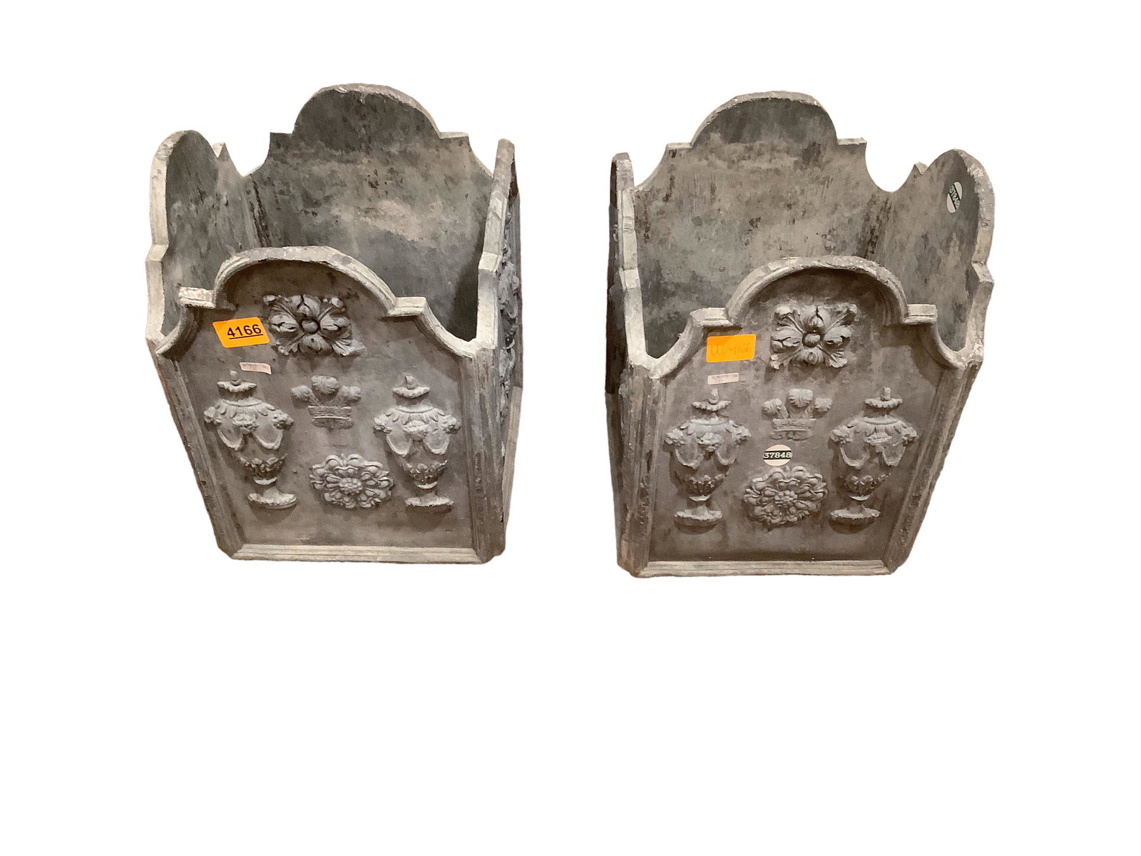 Pair of heavy metal planters with raised classical motif, 12” x 11” x 15”. (1 of 4)