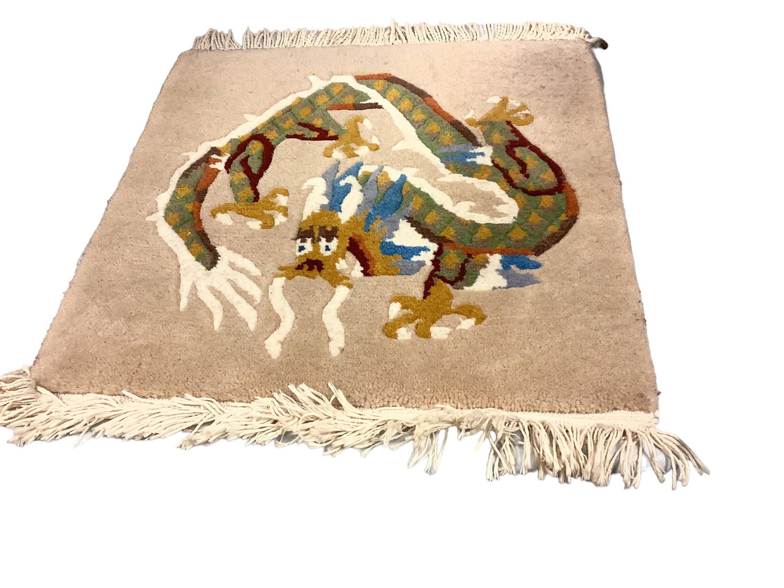 Very nice 4 Asian style dragon woven decorative rugs measuring 19” square, not including (1 of 1)