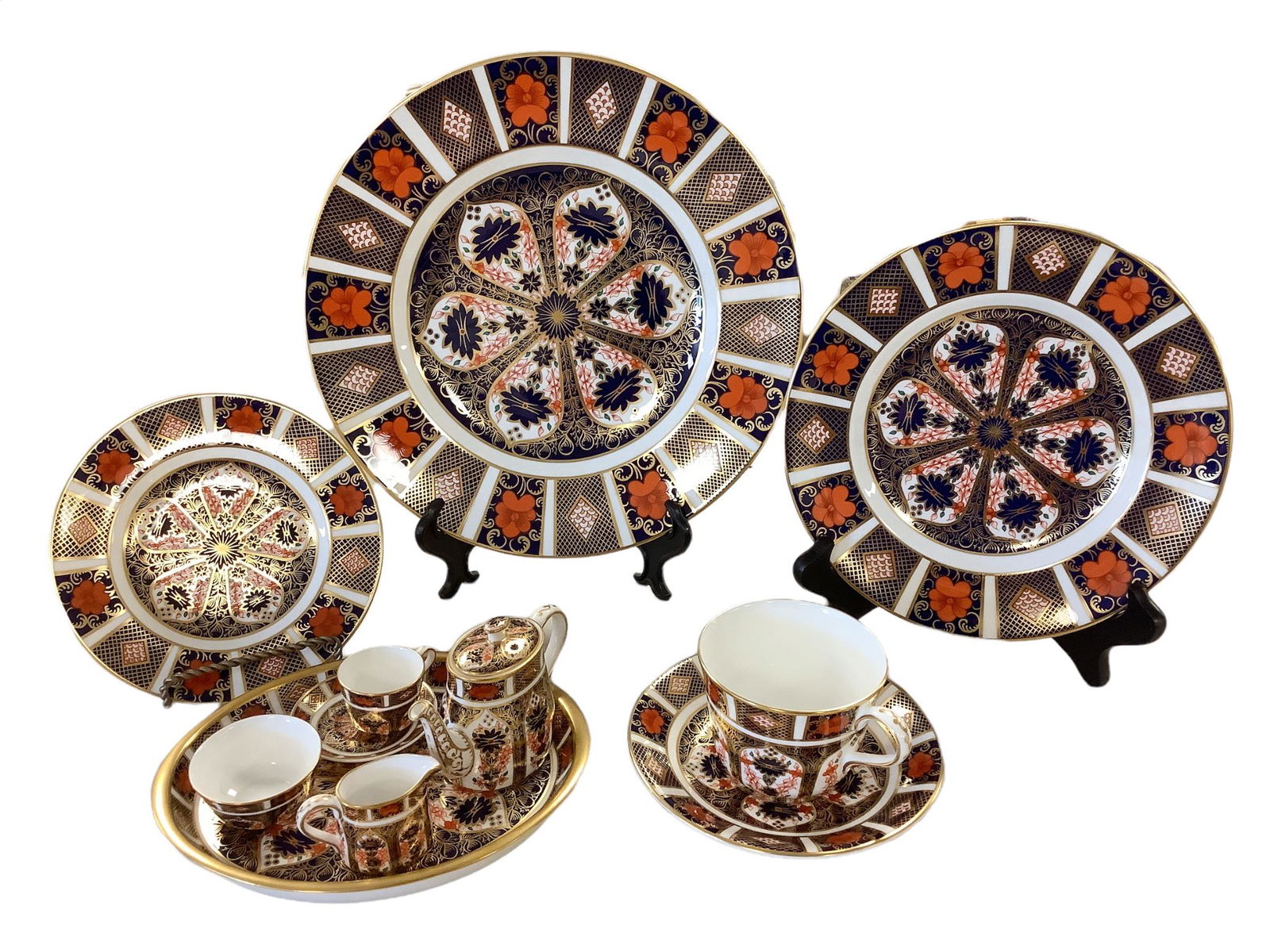 Lot of Royal Crown Derby “Old Imari” english bone china including a dinner plate,: Lot of Royal Crown Derby “Old Imari” english bone china including a dinner plate, dessert plate, bread plate, cup with saucer and a miniature 6 piece tea service.
