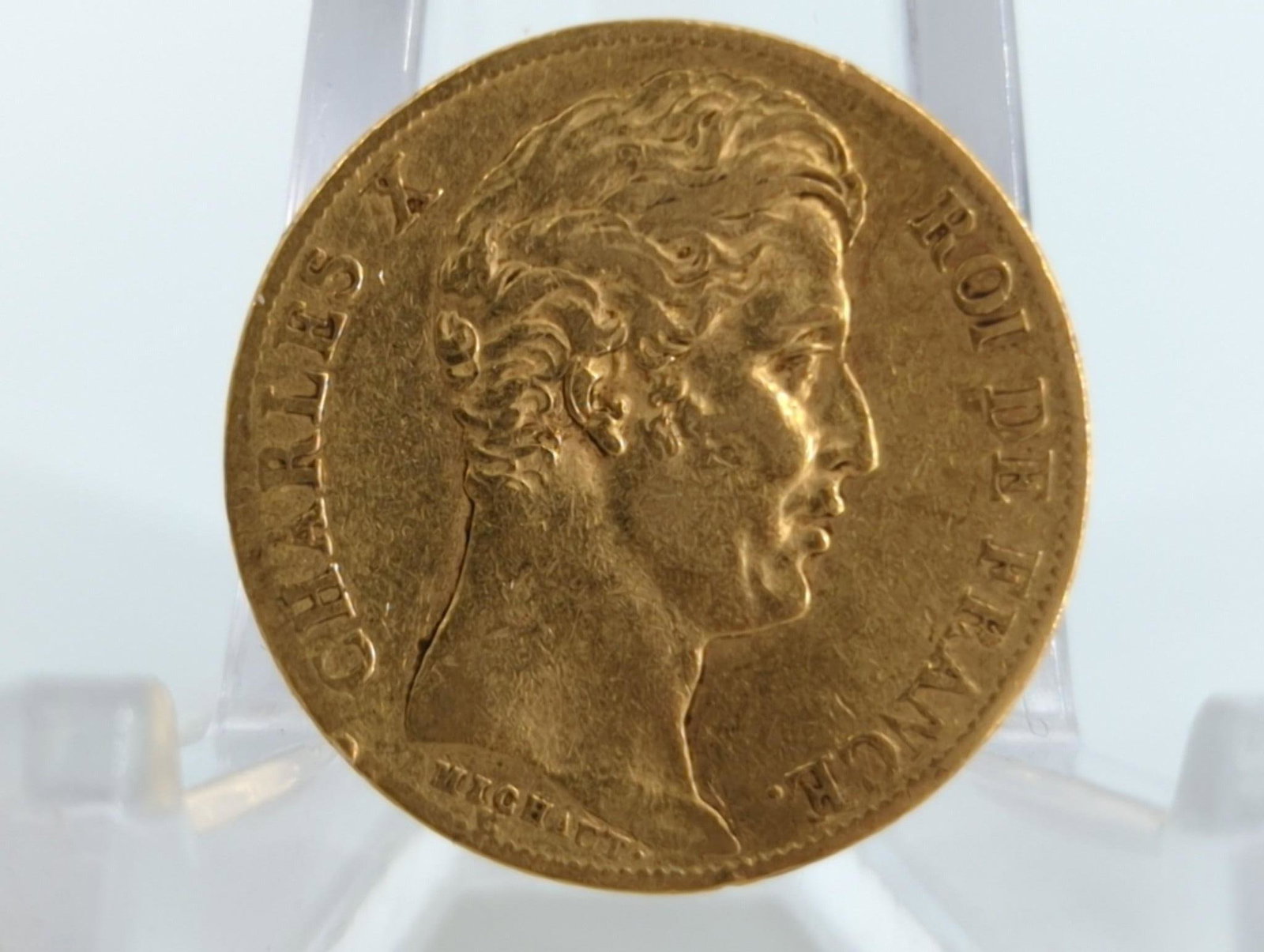 France 1828A 20 Francs Gold Coin: France 1828A 20 Francs Gold Coin Charles X portrait, not professionally graded, 90% fine gold composition, approximately 6.45 grams total weight, Paris mint. *This lot is tax exempt*