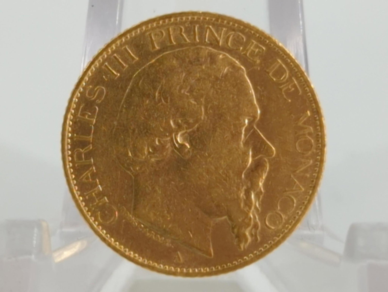 Monaco 1878 20 Francs Gold Coin: Monaco 1878 20 Francs Gold Coin 90% fine gold composition, 6.45 grams total weight, not professionally graded, Charles III portrait, *This lot is tax exempt*