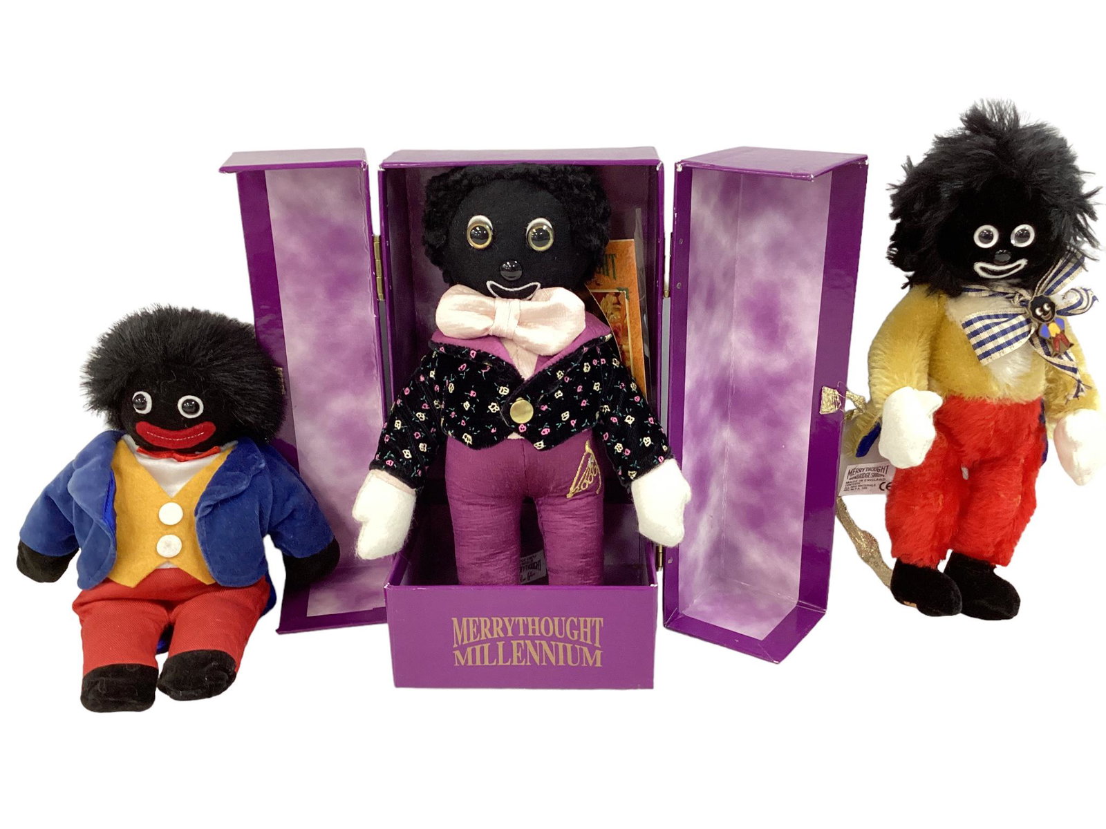 (3) cloth dolls including 9 1/2" James Robertson & Sons, velveteen head with appliqued button eyes: (3) cloth dolls including 9 1/2" James Robertson & Sons, velveteen head with appliqued button eyes and mouth, button nose, embroidered smile, straight black hair. Velveteen and broadcloth body with mi