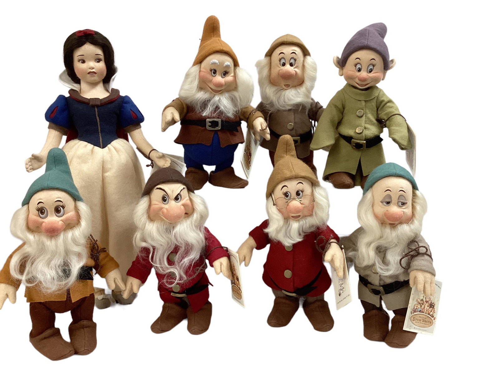R. John Wright all wool felt Snow White and the Seven Dwarfs. Includes 16" Princess Snow White with: R. John Wright all wool felt Snow White and the Seven Dwarfs. Includes 16" Princess Snow White with human hair wig, molded and painted facial features, on five-piece body with disk jointed arms and le
