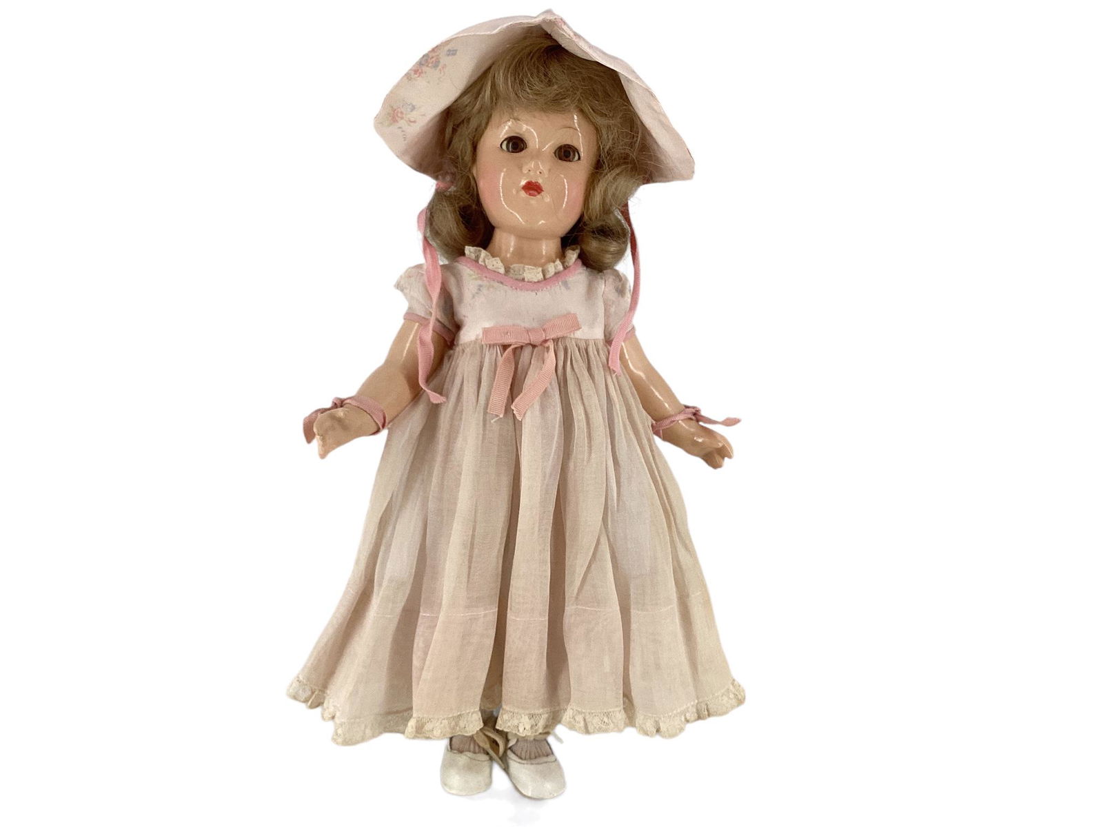 15" Effanbee "Anne Shirley" composition socket head doll, mohair wig, sleep eyes with applied: 15" Effanbee "Anne Shirley" composition socket head doll, mohair wig, sleep eyes with applied eyelashes, painted eyelashes and facial features, closed mouth. She is wearing a pink dress trimmed in lac
