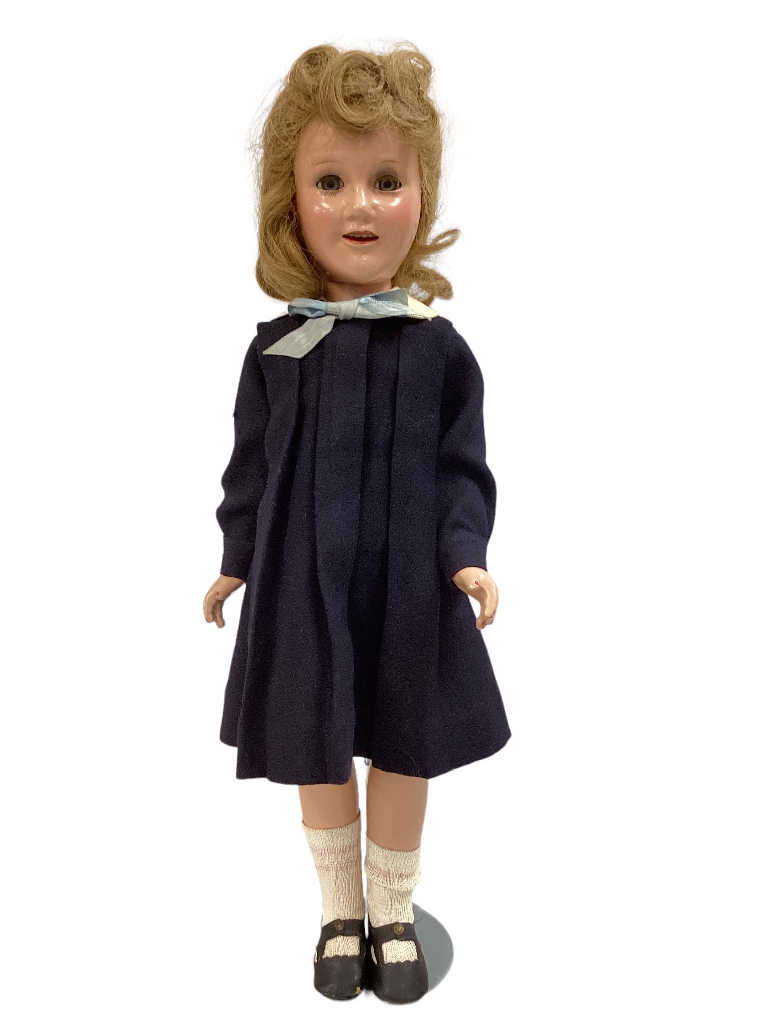 Ideal composition "Deanna Durbin". 21" doll with human hair wig, sleep eyes with eyelashes, open: Ideal composition "Deanna Durbin". 21" doll with human hair wig, sleep eyes with eyelashes, open mouth with teeth, on five-piece body. Deanna wears a navy wool shirt dress, underpants, center snap sho