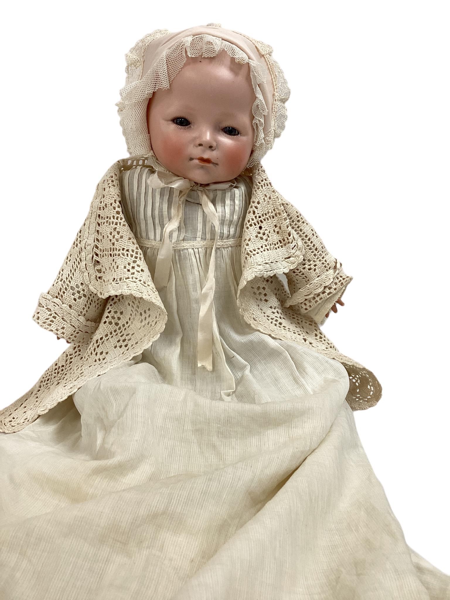 Schoenau & Hoffmeister bisque flange head baby. 12" circ solid dome head, painted hair, stationary (1 of 3)