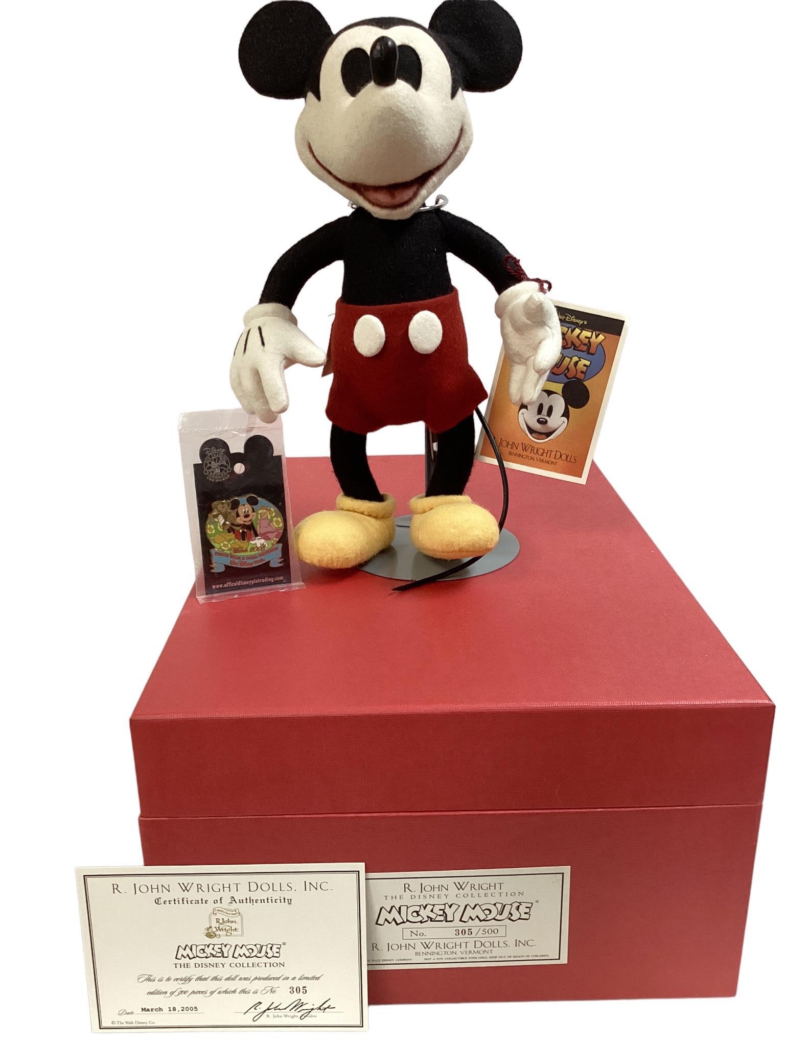 R. John Wright 12" tall "Mickey Mouse", (2005) all-felt, fully jointed, molded and hand painted: R. John Wright 12" tall "Mickey Mouse", (2005) all-felt, fully jointed, molded and hand painted features and leather nose and tail. Wearing trademark red shorts and yellow shoes. Walt Disney Pin inclu