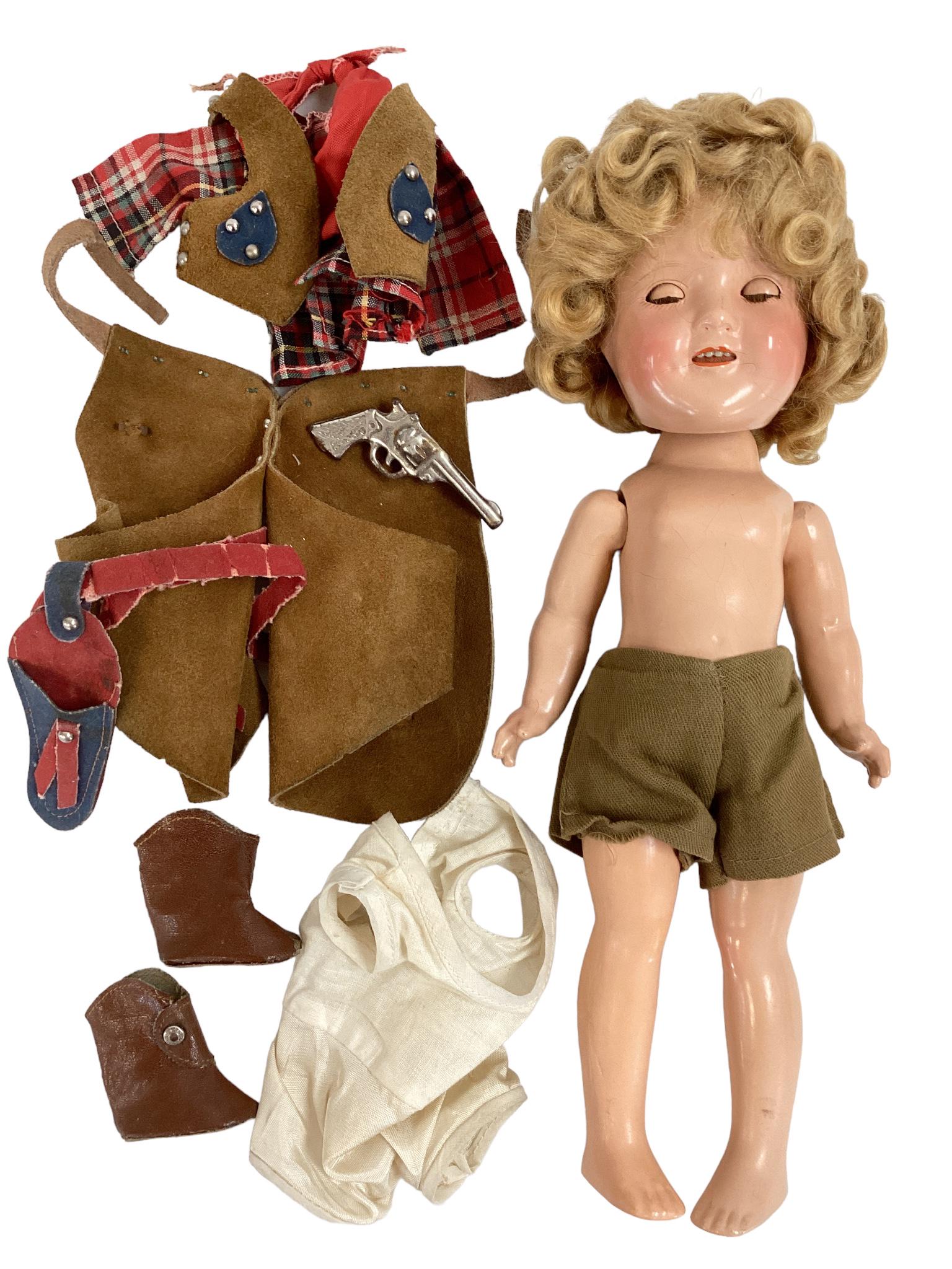 Ideal composition Shirley Temple 12" doll with Texas Ranger costume, body is loosely strung and: Ideal composition Shirley Temple 12" doll with Texas Ranger costume, body is loosely strung and slightly crazed, felt 1836 Texas Centennial hat (stained), vintage white dress with nautical decoration 