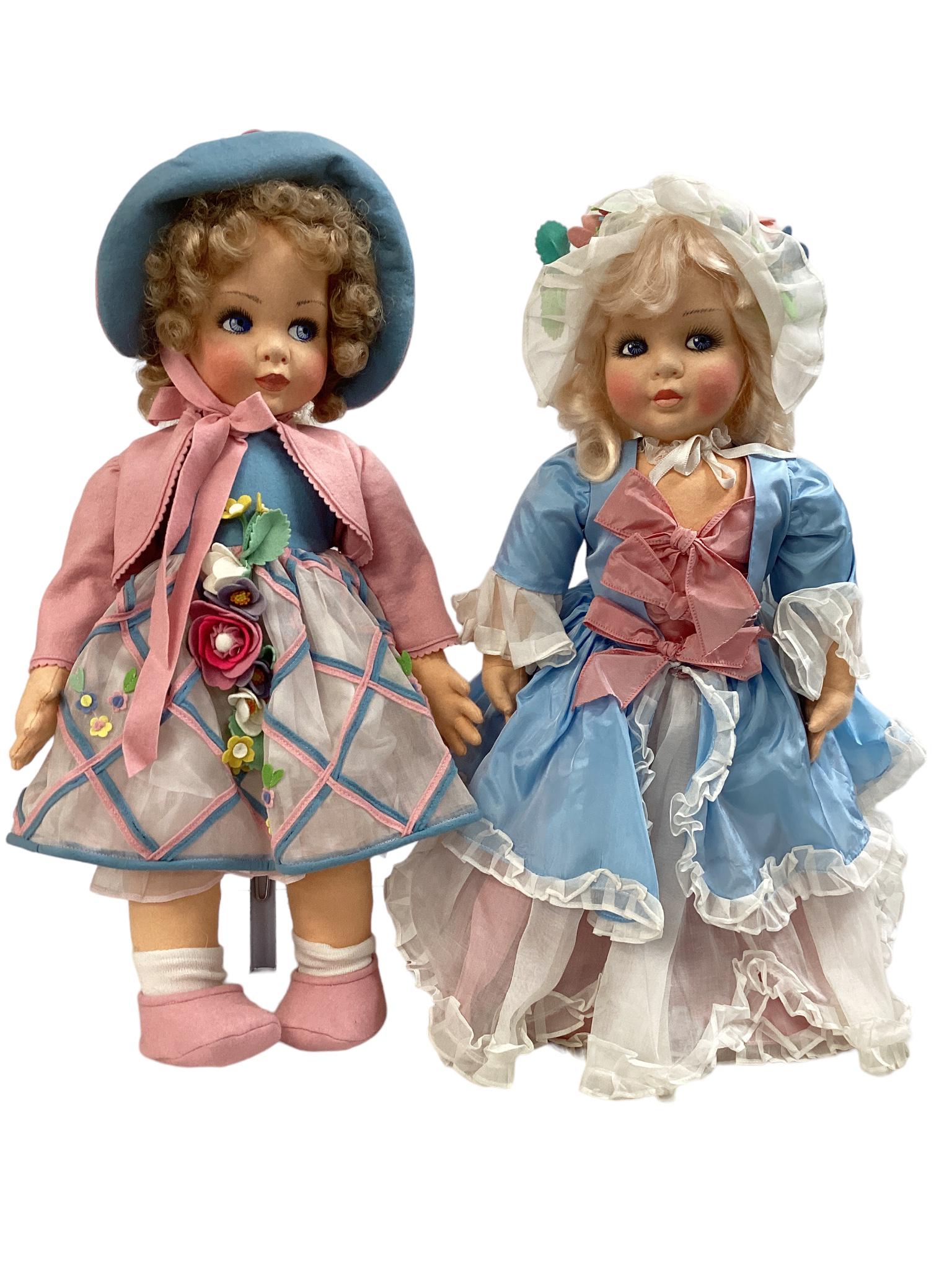 A pair of 21" & 22" Anili cloth dolls, dressed in felt and organdy, tagged. (1 of 3)