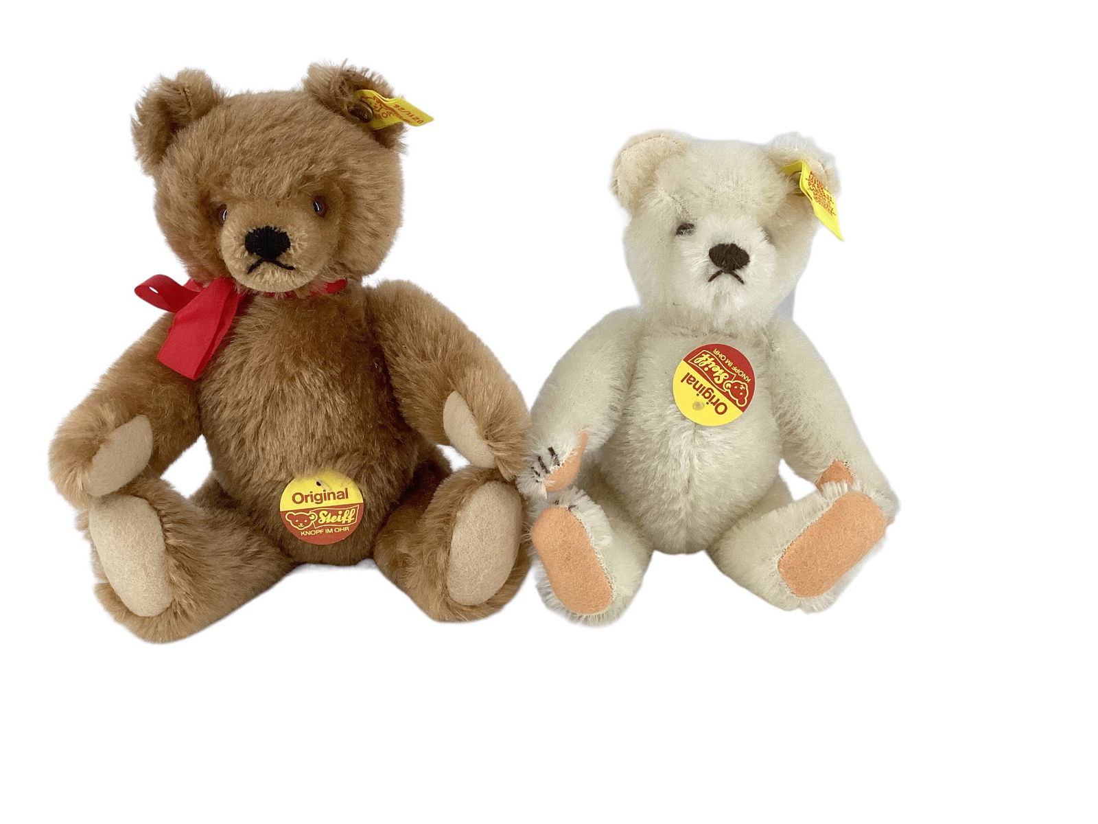(2) Steiff bears including 8 3/4" white mohair, button eyes, sewn nose, mouth and claws w/tags and 9 (1 of 2)