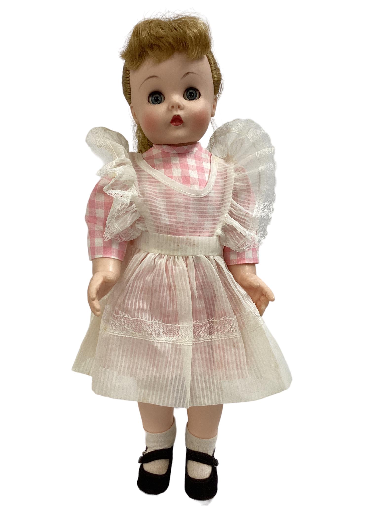Madame Alexander 16" doll marked 1950 with pink checked dress and white apron. (1 of 5)