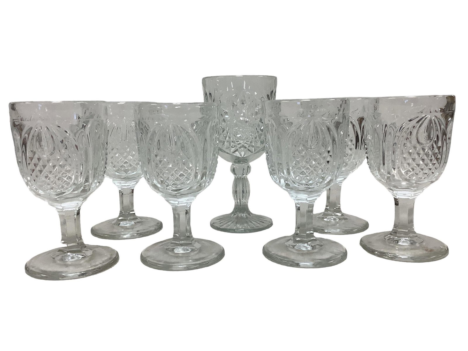Seven Vintage Glass Goblets Including Fenton: Set of 6 Fenton Pineapple goblets measuring 3.25î diameter at opening and 6 1/8î tall.One Libby Glass Company Hobstar goblet measuring 3 3/8î diameter at opening and 7 1/8î tall.