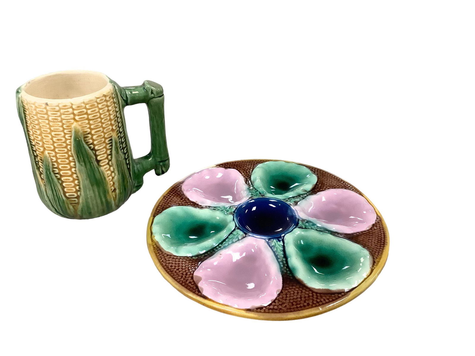 Majolica Corn Mug and Oyster Plate: Oyster plate measures 9.75î diameter and. Corn mug is 5.75î tall.
