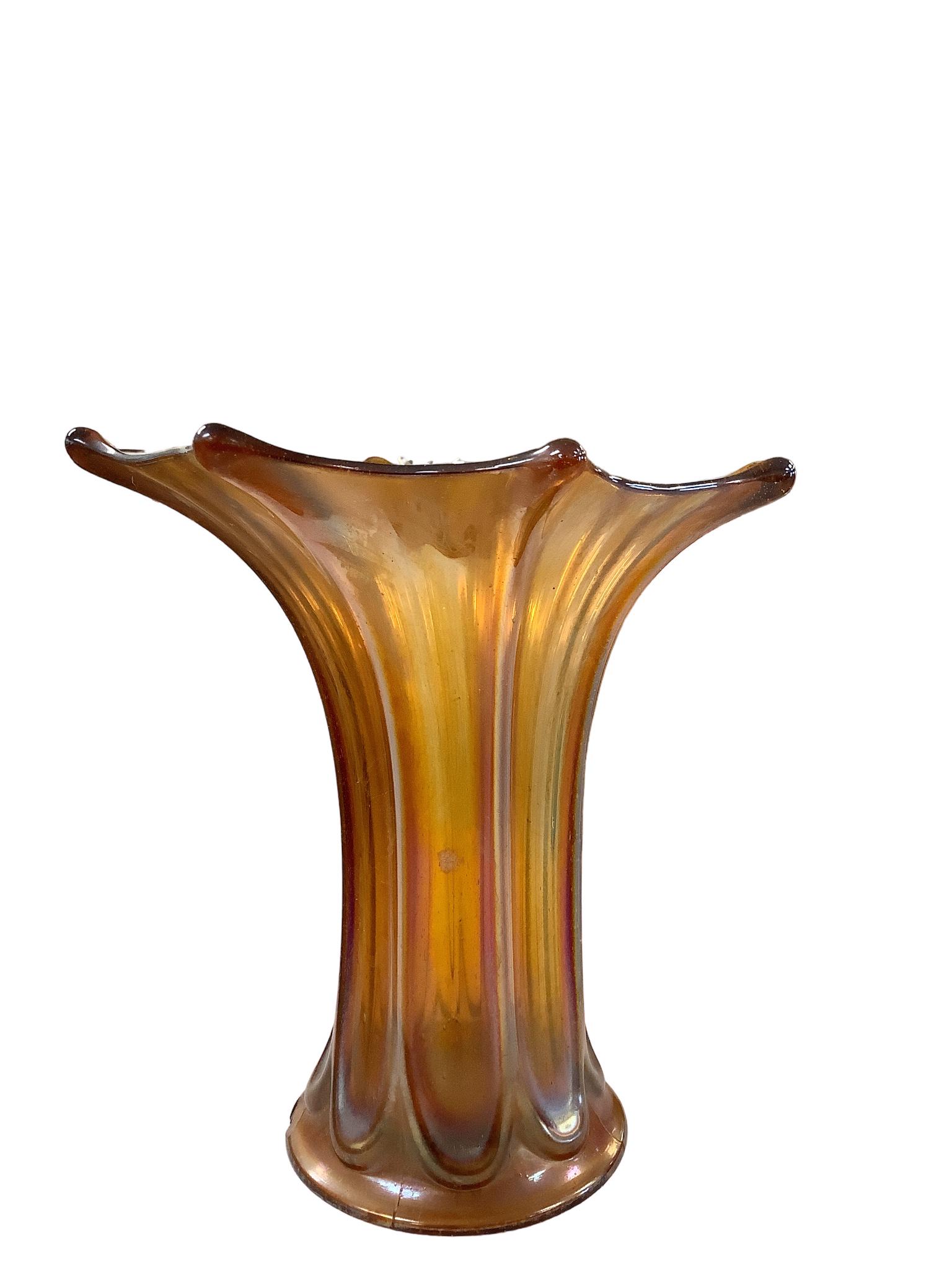 Vintage Amber Carnival Glass vase: Vintage Amber Carnival Glass vase Vase measures 9.5” High and 9” Diameter at opening. Has small chip at base (see photo).